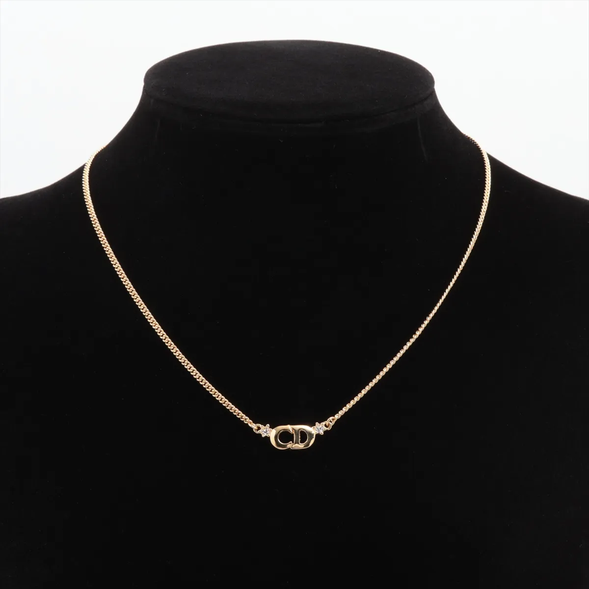 CD logo necklace, gold plated with rhinestones. Shows signs of wear, — view 5