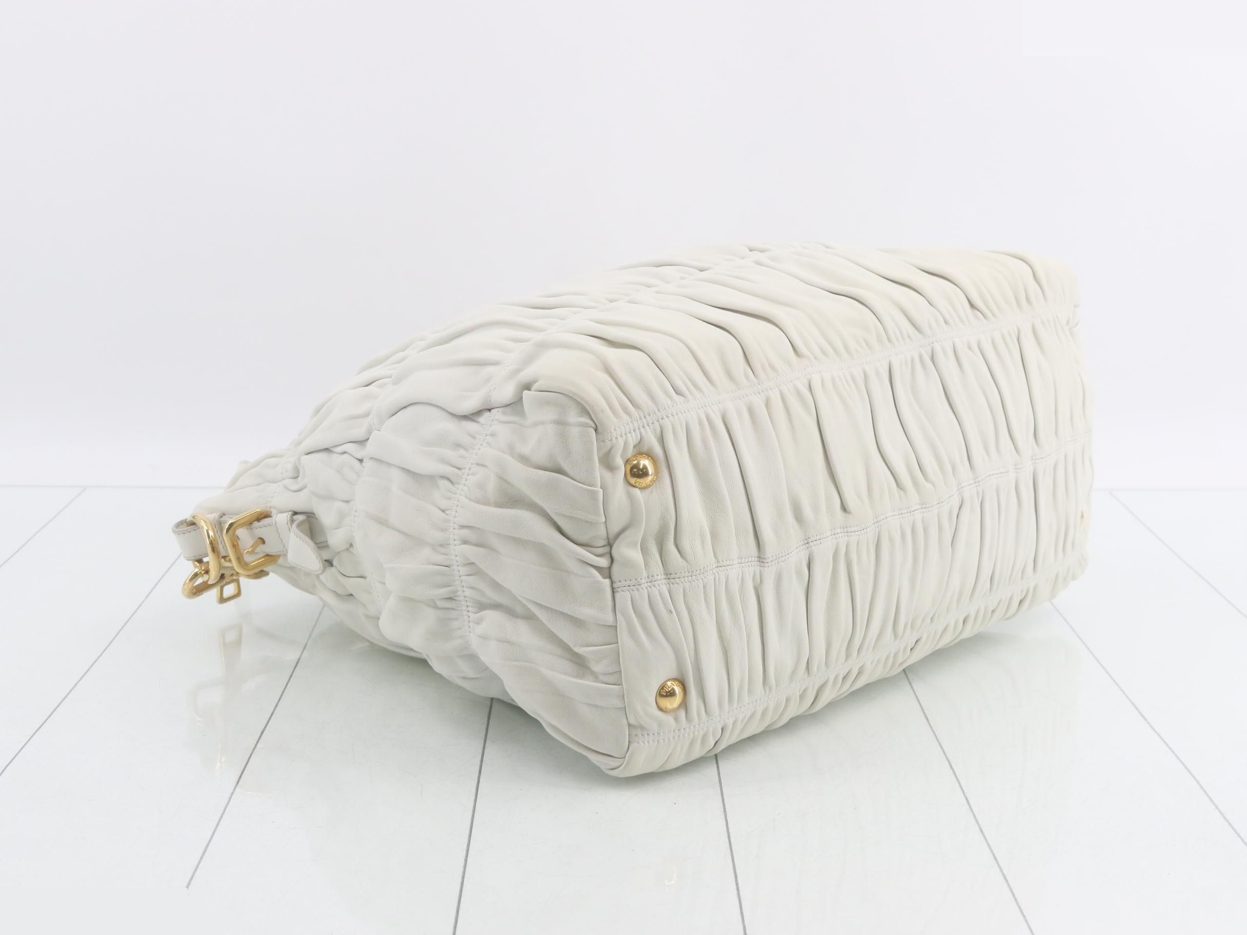 Leather 2-way gathered handbag with shoulder strap and dust bag. — view 5