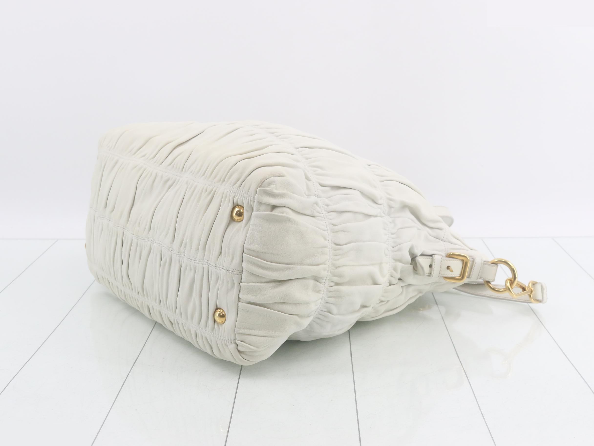 Leather 2-way gathered handbag with shoulder strap and dust bag. — view 6