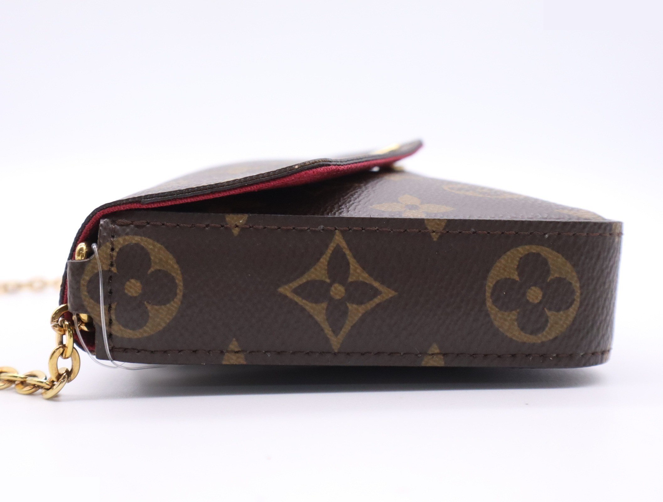 Pochette Felice, Fuchsia, with shoulder strap and dust bag. — view 3