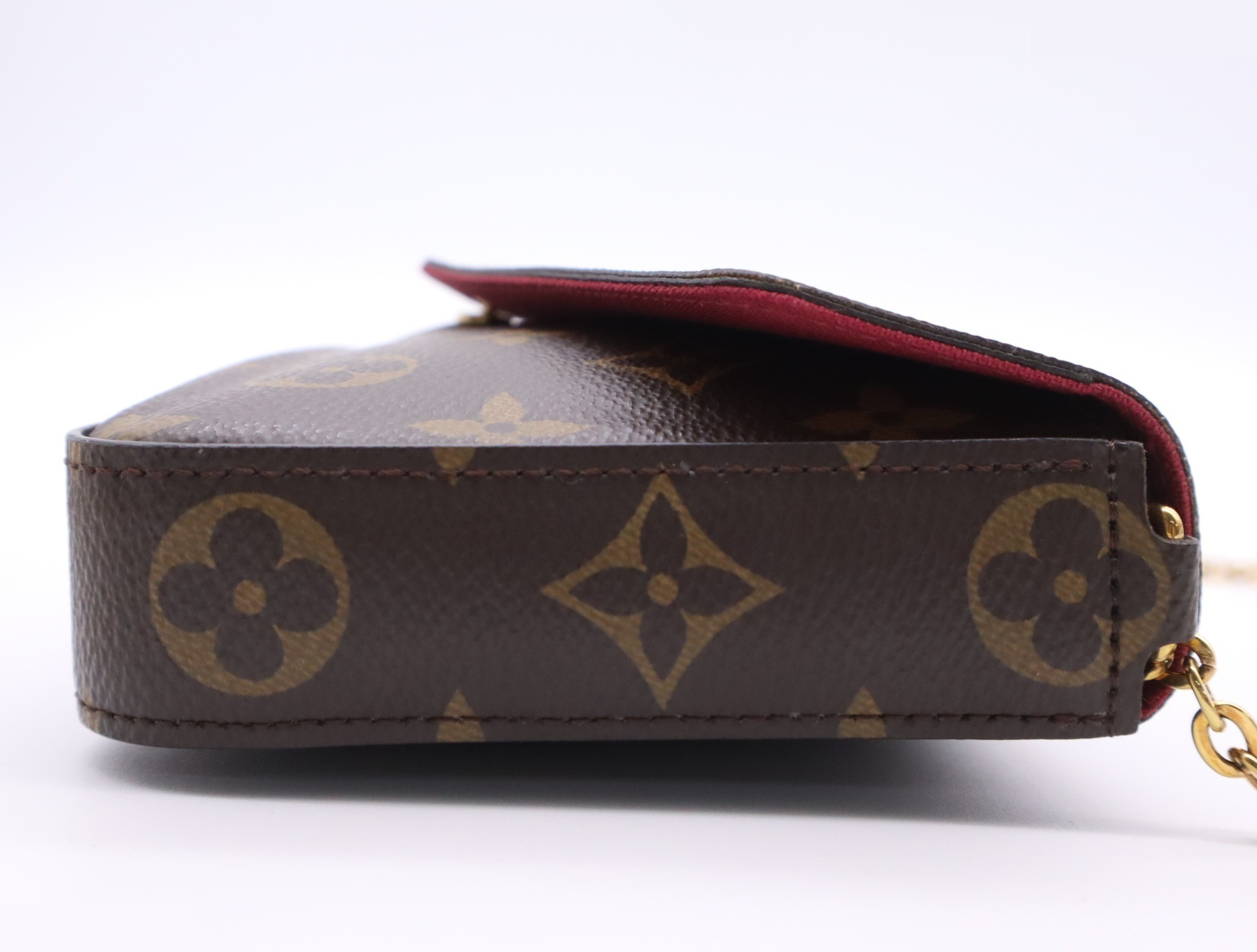Pochette Felice, Fuchsia, with shoulder strap and dust bag. — view 4