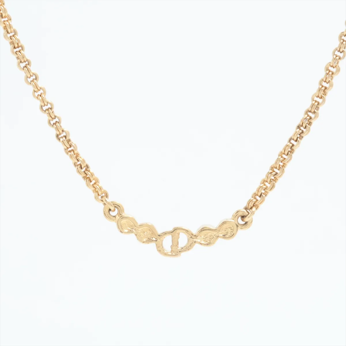 CD logo necklace, gold plated with rhinestones. Shows signs of wear, — view 2