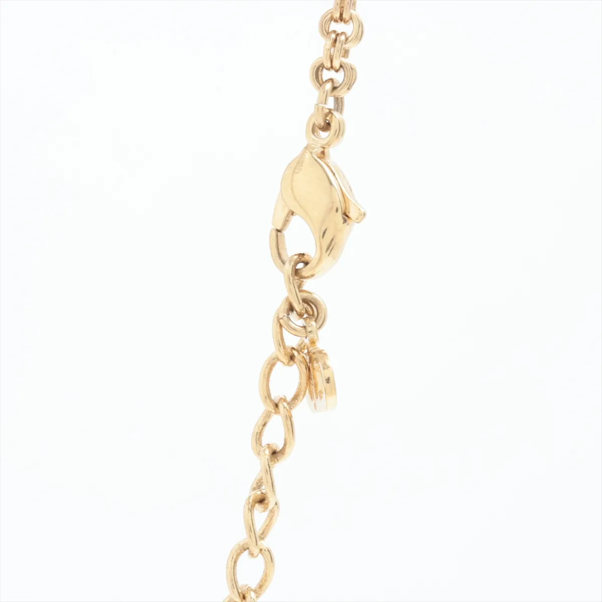 CD logo necklace, gold plated with rhinestones. Shows signs of wear, — view 3