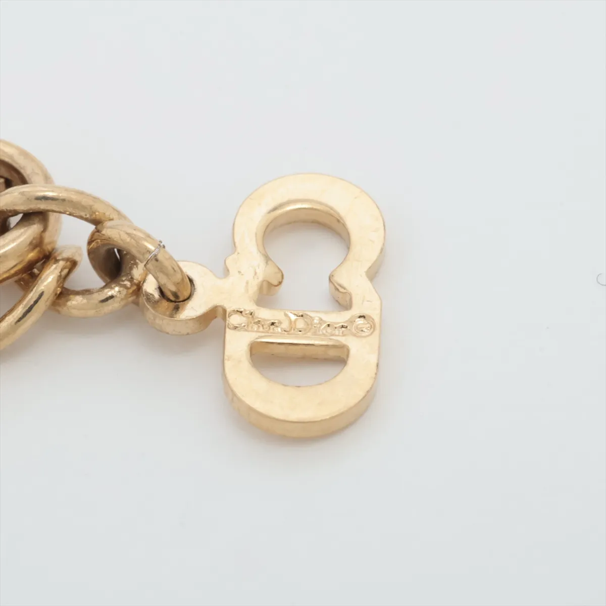 CD logo necklace, gold plated with rhinestones. Shows signs of wear, — view 4