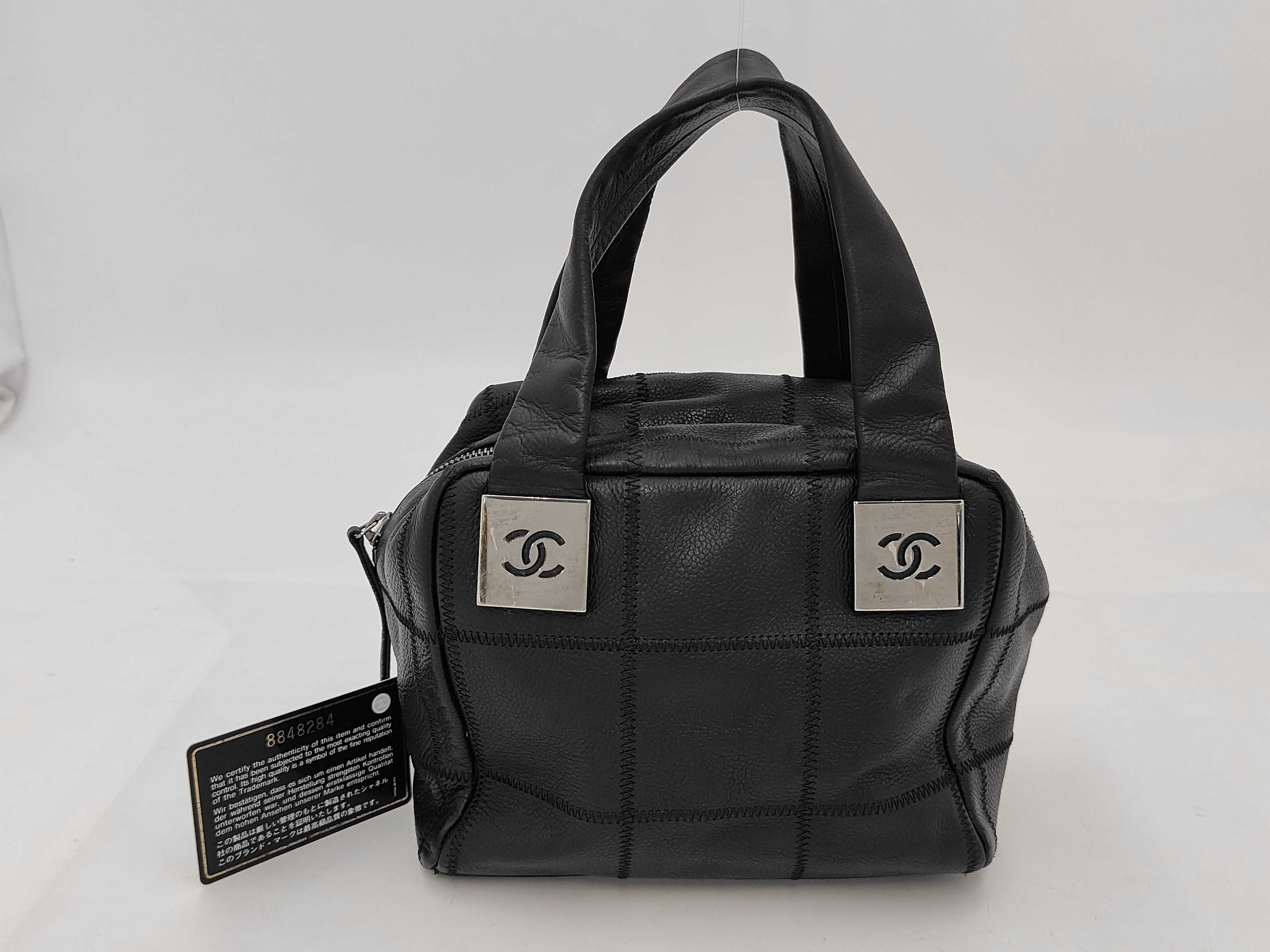 Chocolate Bar Handbag, serial number 8, with sticker card.