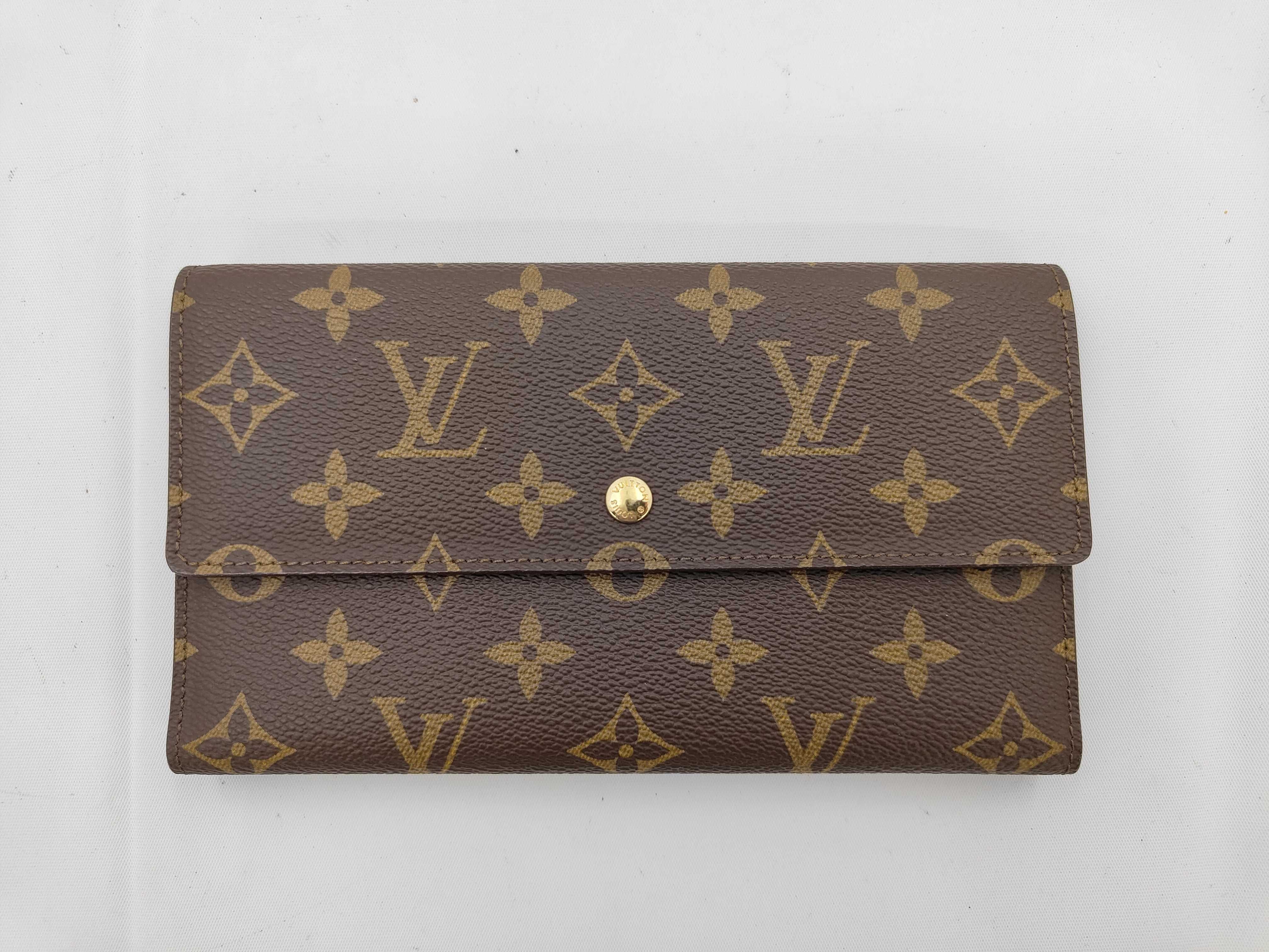 Monogram Louis Vuitton Portefeuille Tresor International Tri-fold Long Wallet Monogram M61215 Wallet