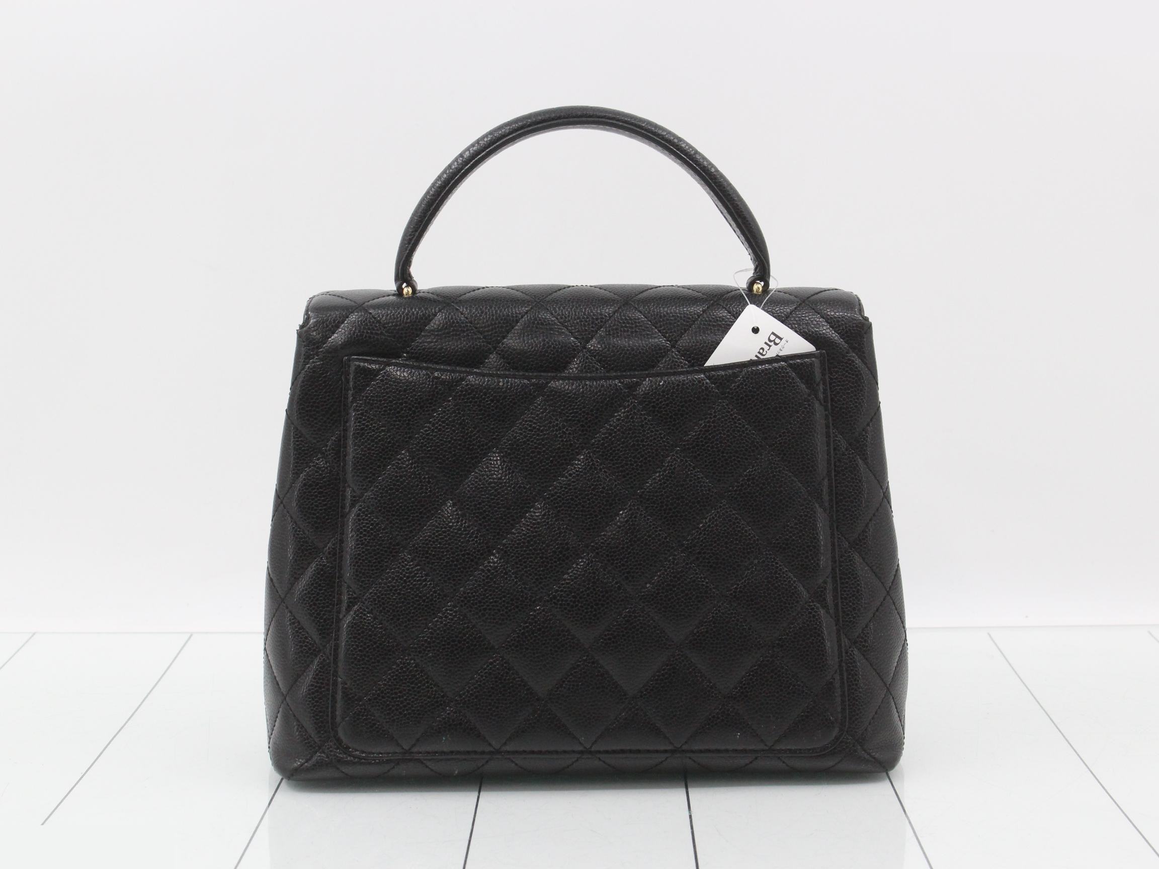 Kelly-style handbag, black, with original seal. — view 2