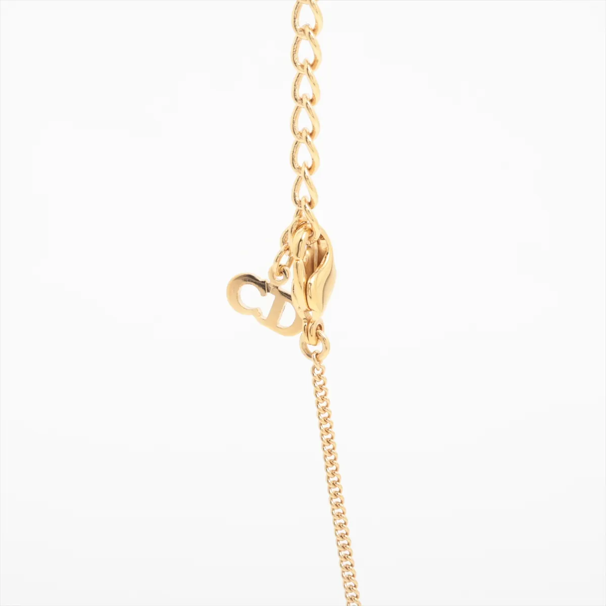 necklace, gold plated with rhinestones. Shows wear, tarnishing, and stains. — view 3