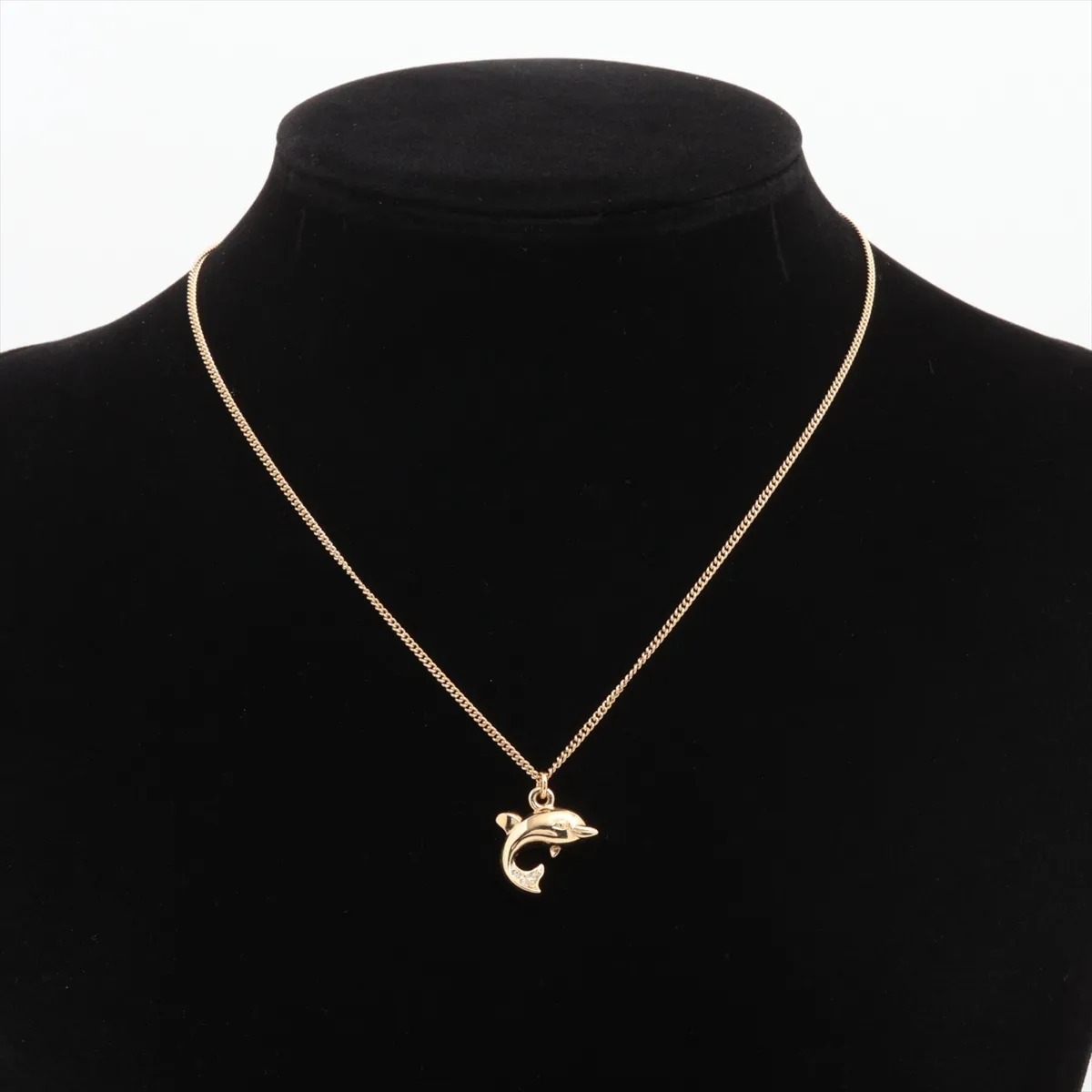 necklace, gold plated with rhinestones. Shows wear, tarnishing, and stains. — view 5