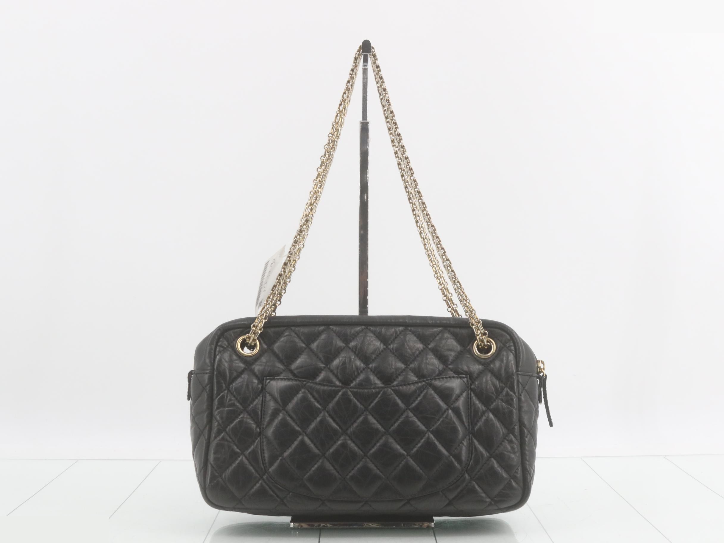 2.55 Shoulder bag, black, gold hardware, with protective seal. — view 2