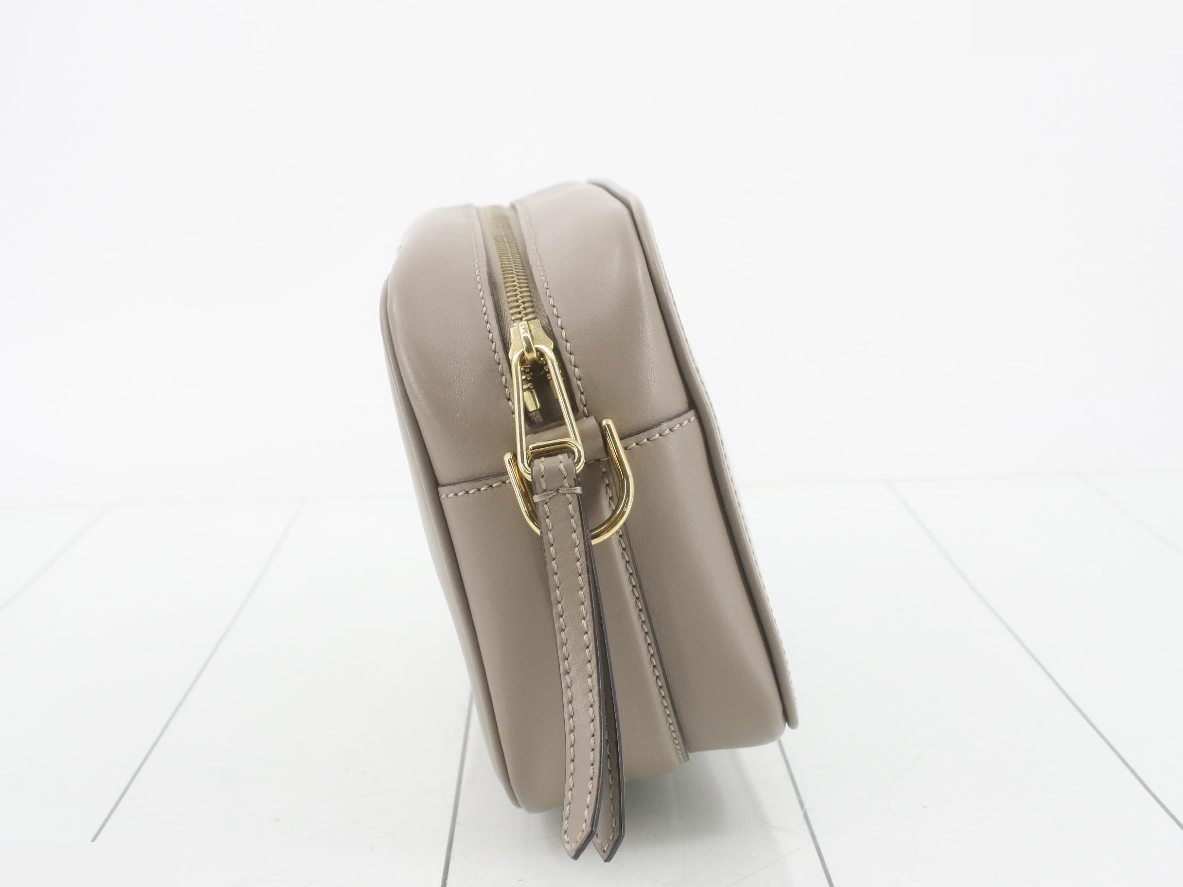 Cam: Original box, dust bag, manufacturer's tag, and strap included. — view 4