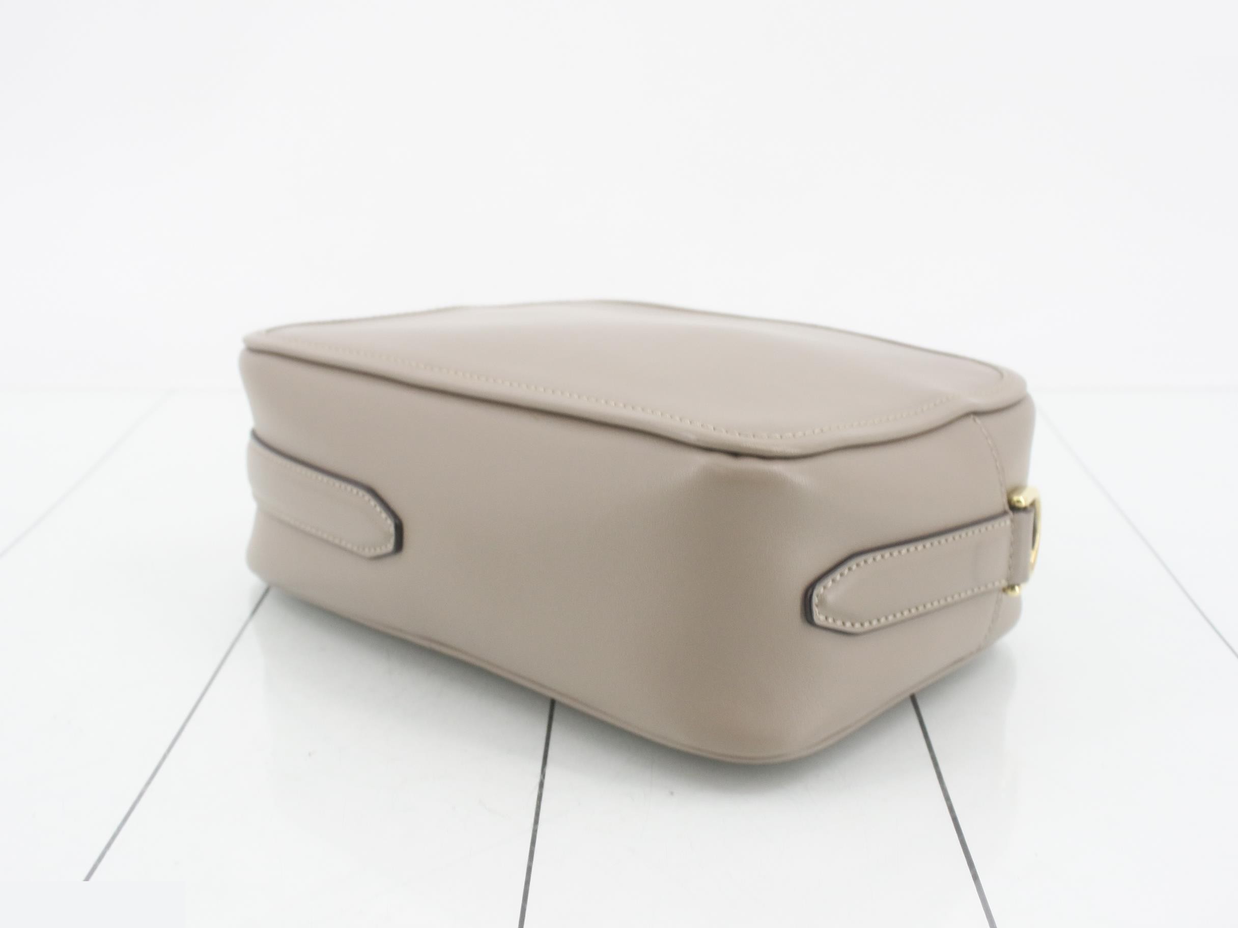 Cam: Original box, dust bag, manufacturer's tag, and strap included. — view 6