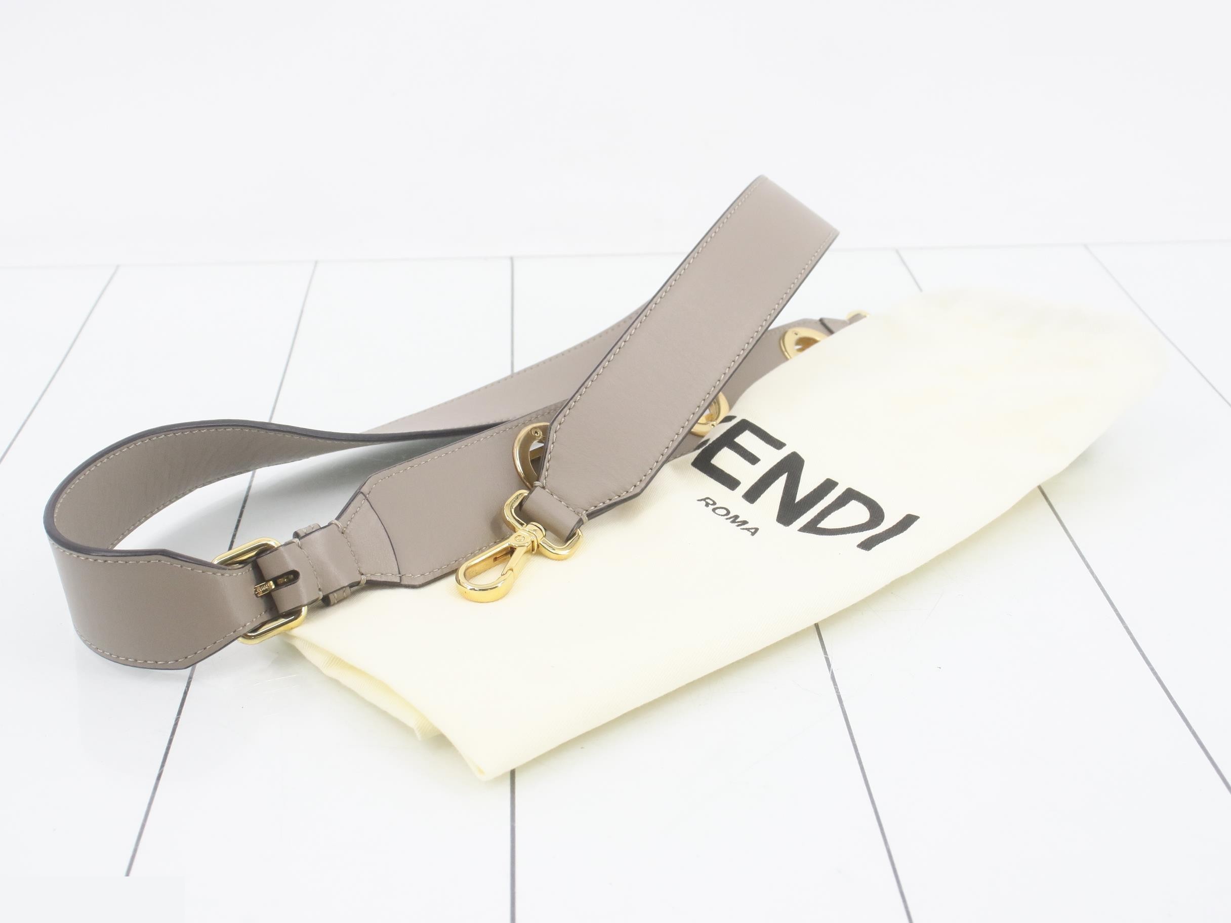 Cam: Original box, dust bag, manufacturer's tag, and strap included. — view 7