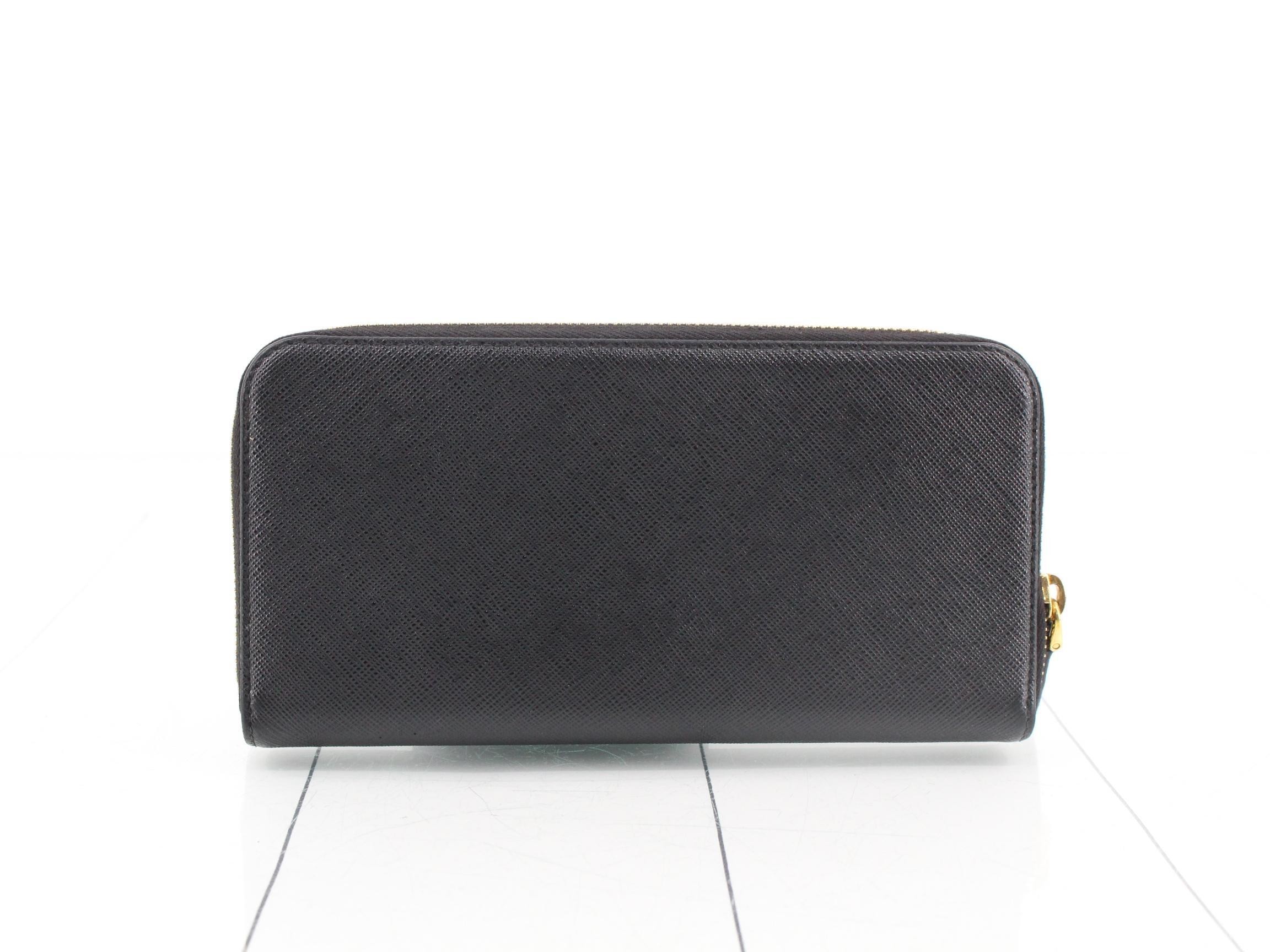 Saffiano leather, triangular logo, zippy wallet, with box. — view 2