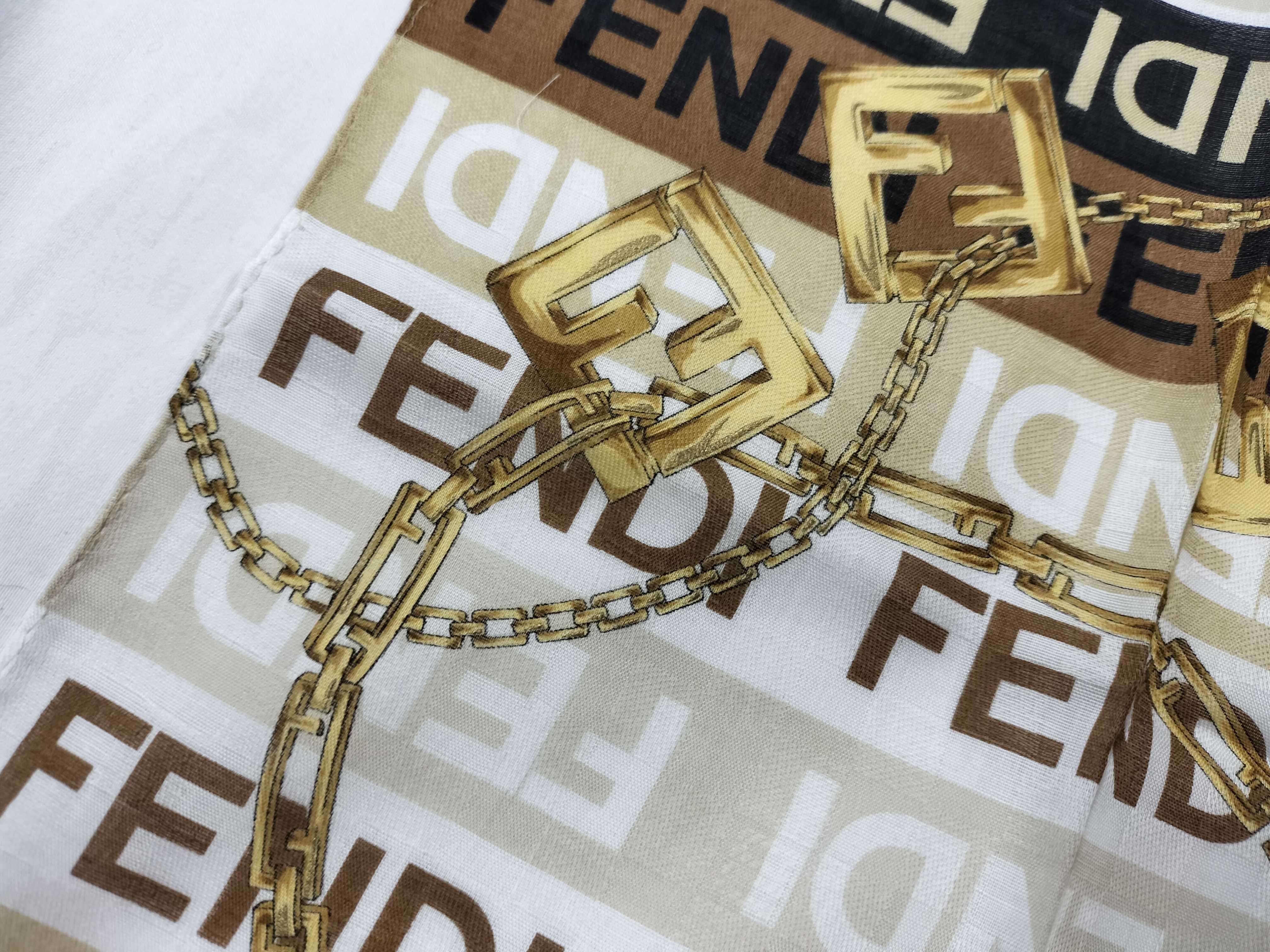 Zucca pattern Fendi handkerchief scarf with sticker, all-over logo print FF Zucca chain, and other accessories. — view 7