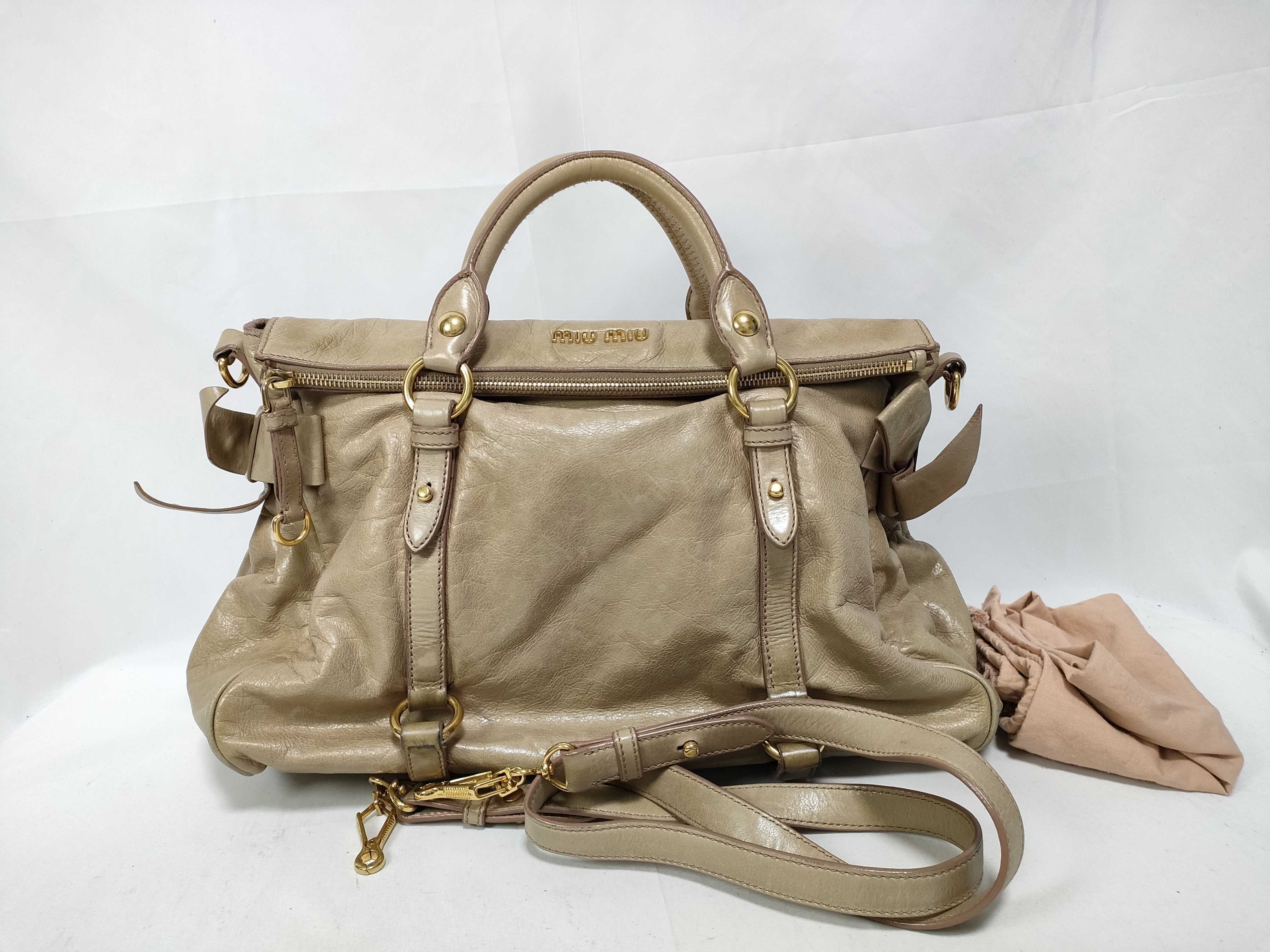 handbag, Vitello Lux leather, beige, with side ribbon.