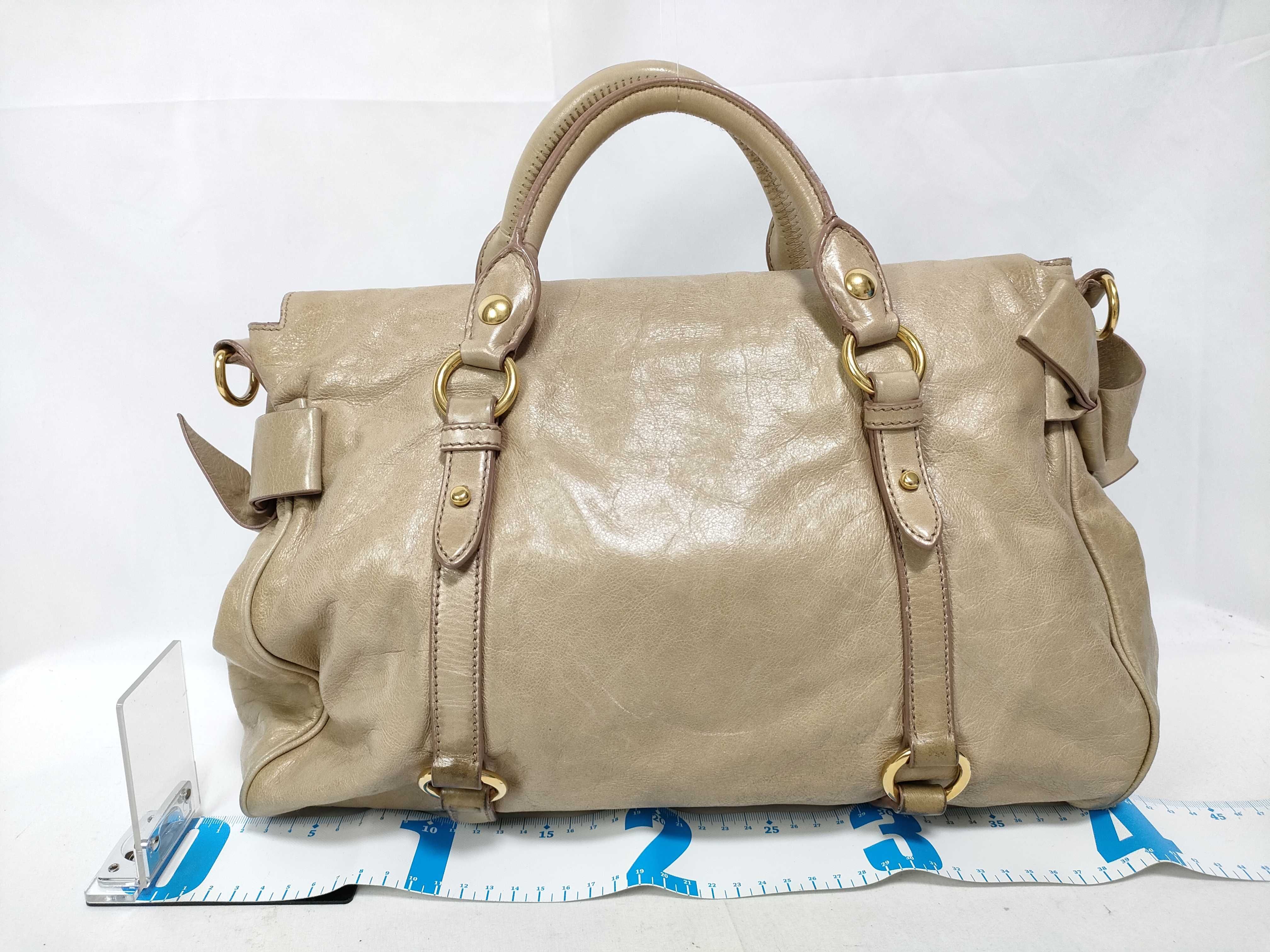 handbag, Vitello Lux leather, beige, with side ribbon. — view 2