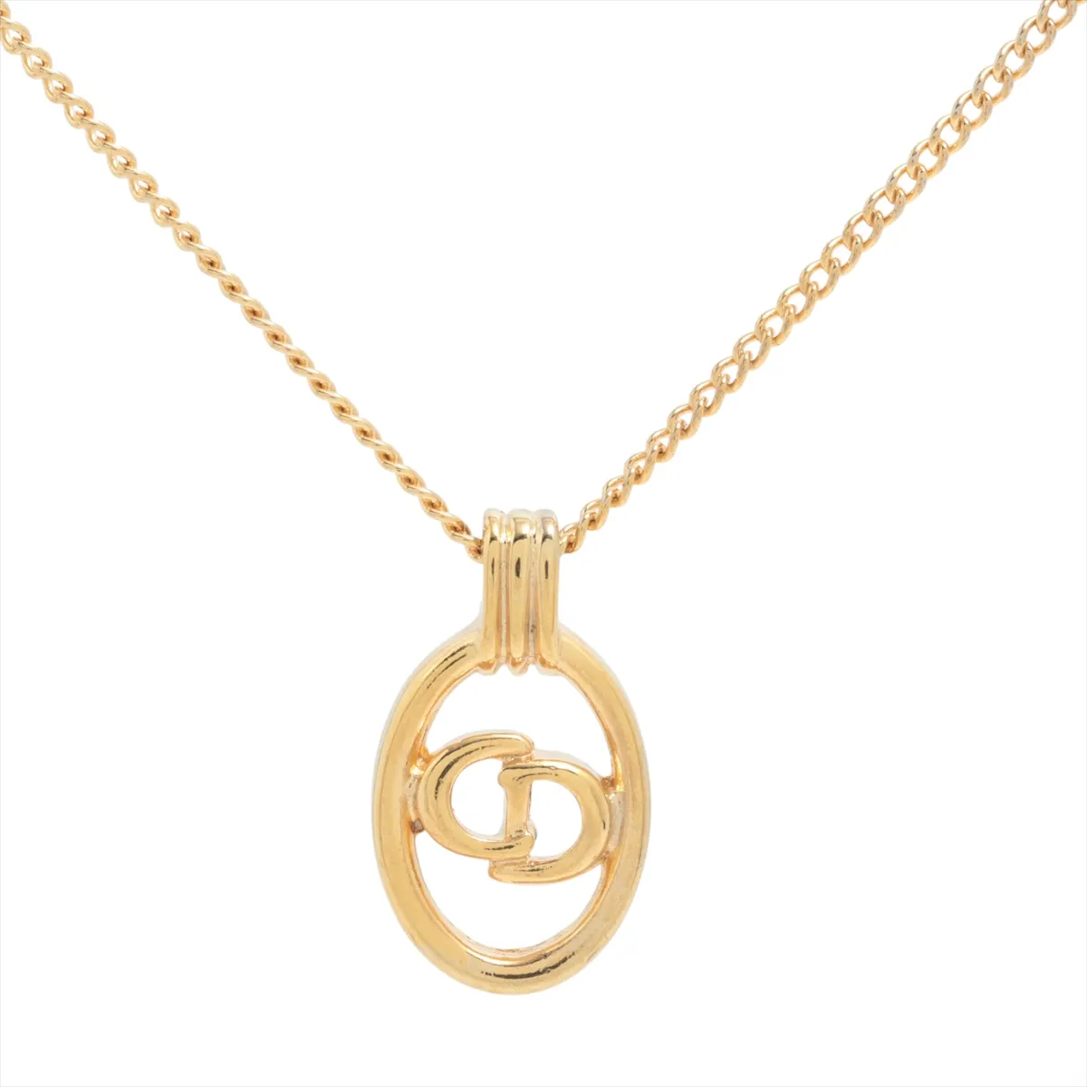 CD logo necklace, GP gold, shows signs of wear, tarnishing,