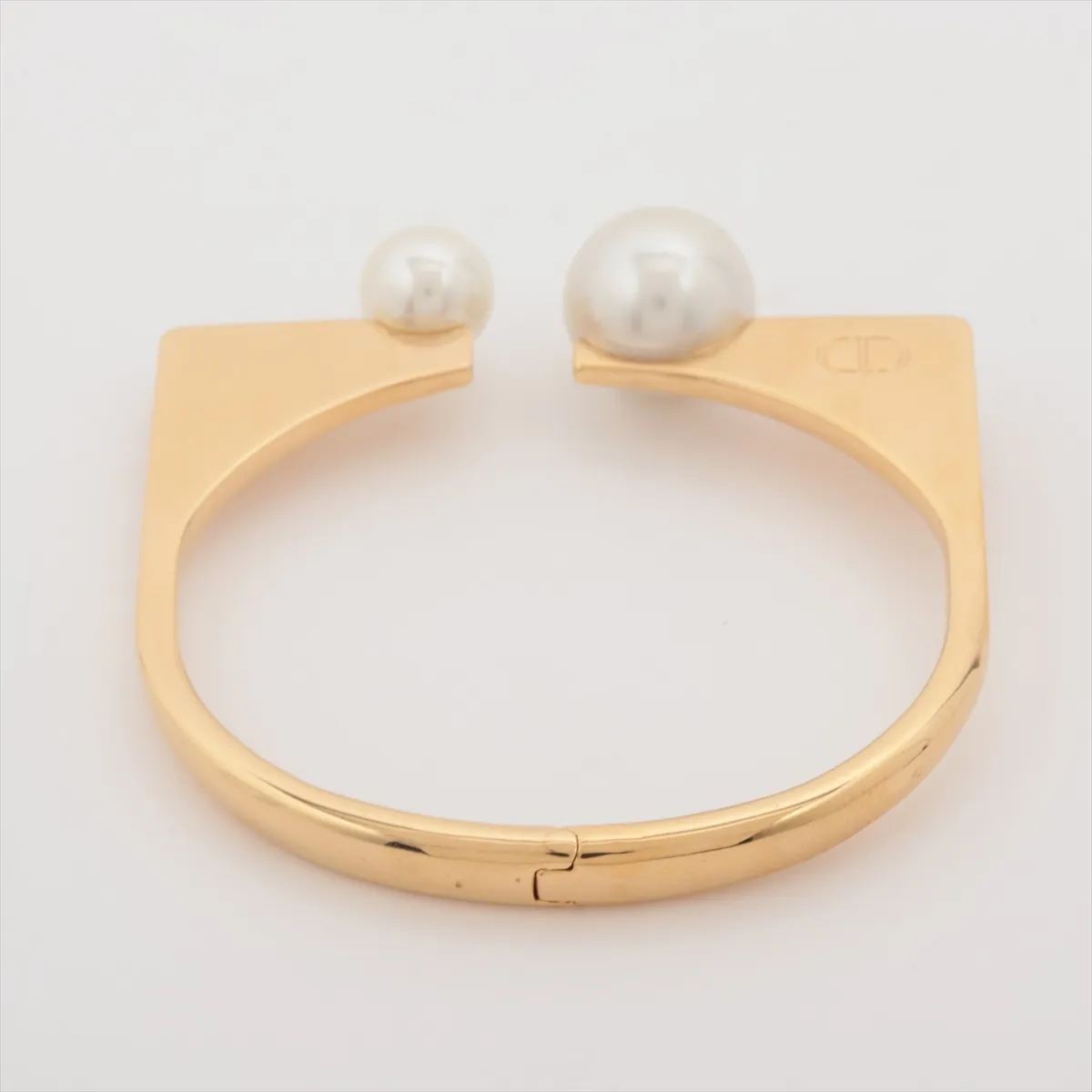 CD logo bangle, gold plated with faux pearls. Shows — view 2
