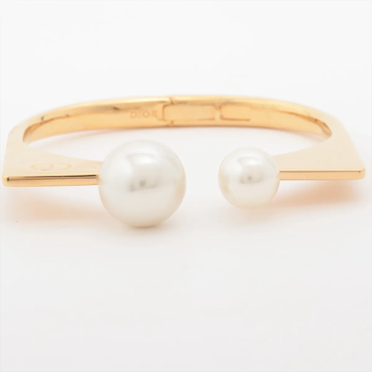 CD logo bangle, gold plated with faux pearls. Shows — view 3