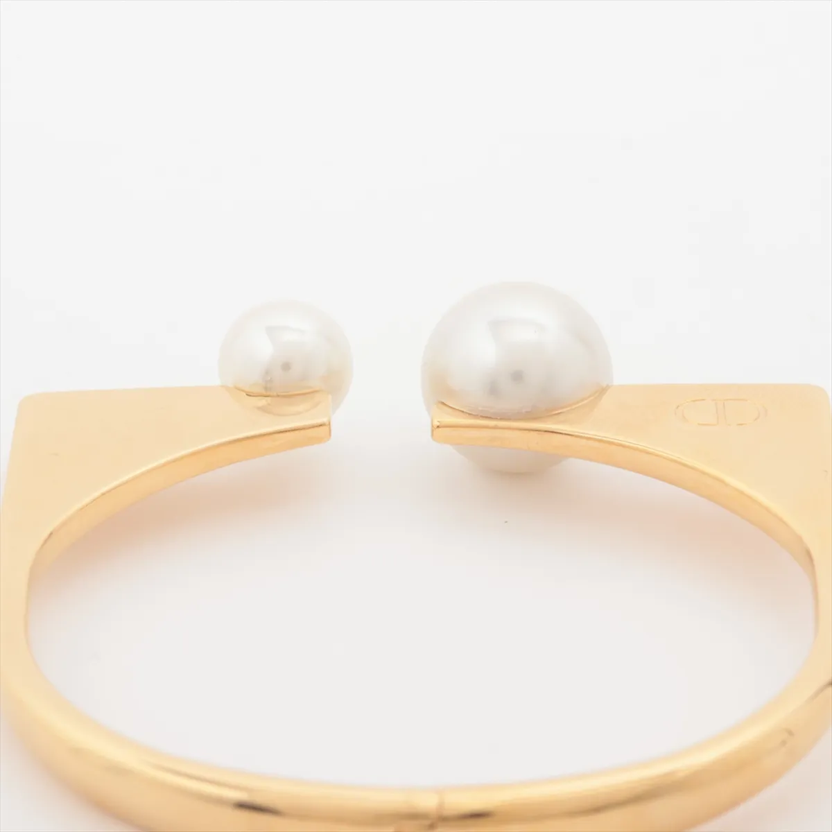 CD logo bangle, gold plated with faux pearls. Shows — view 4