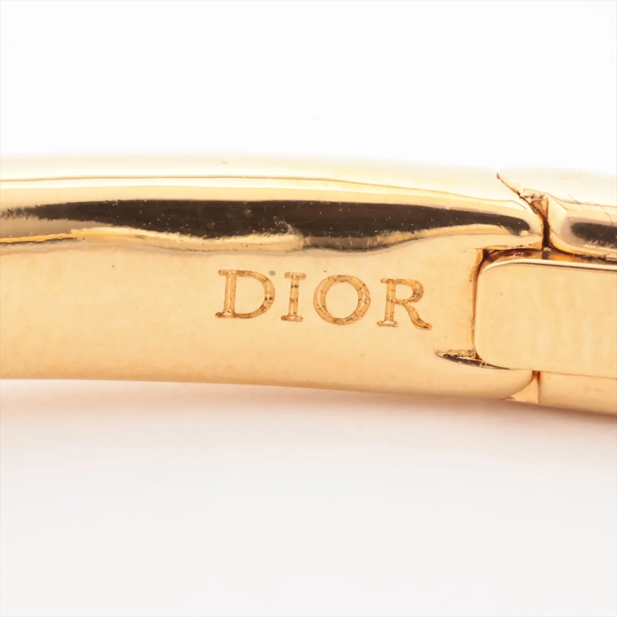 CD logo bangle, gold plated with faux pearls. Shows — view 5