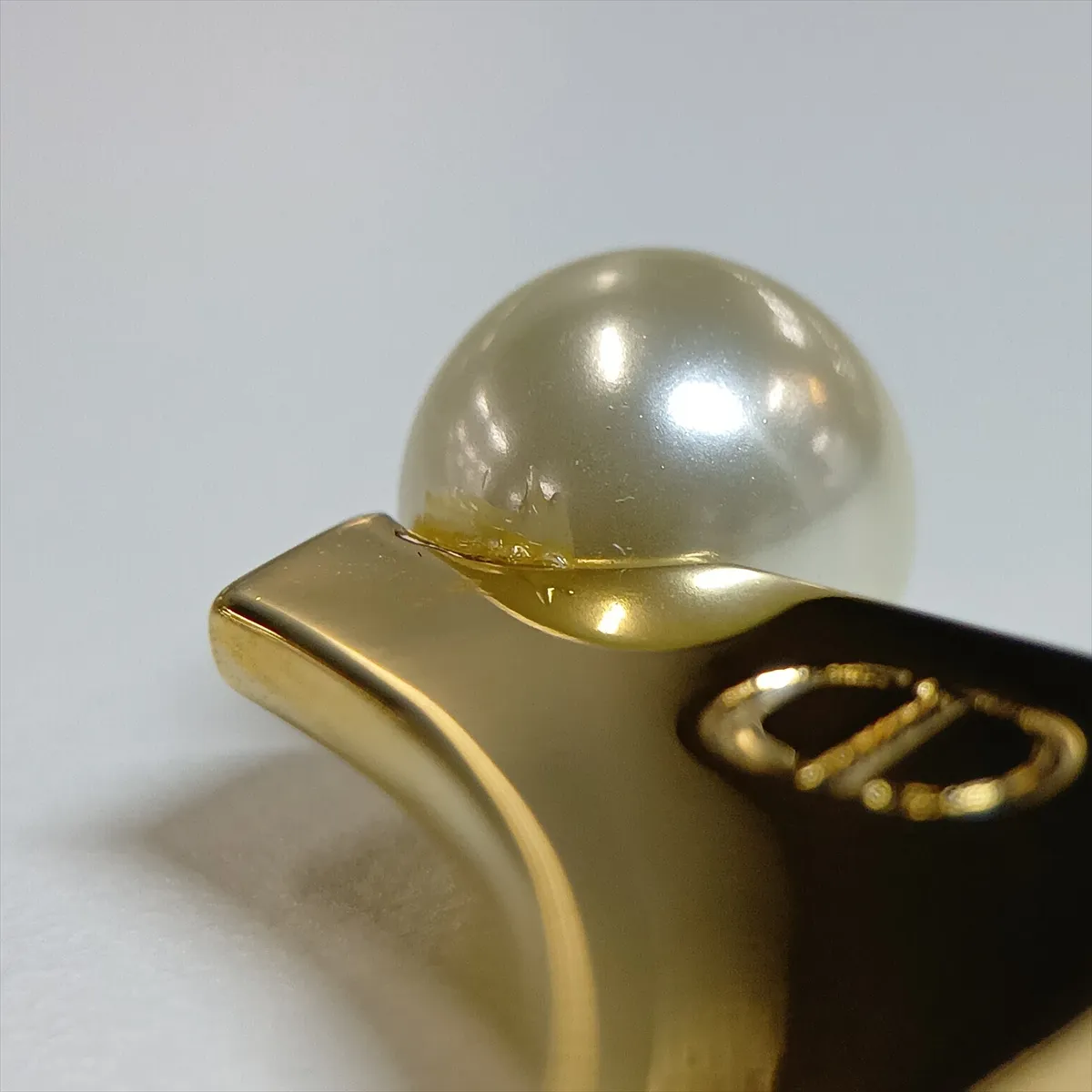CD logo bangle, gold plated with faux pearls. Shows — view 7
