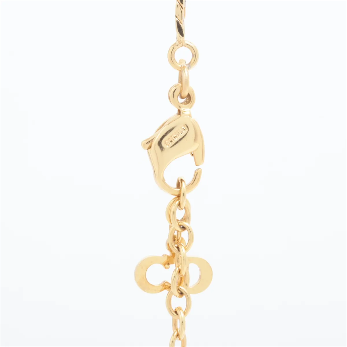 CD logo necklace, gold plated with rhinestones. Shows signs of wear, — view 3