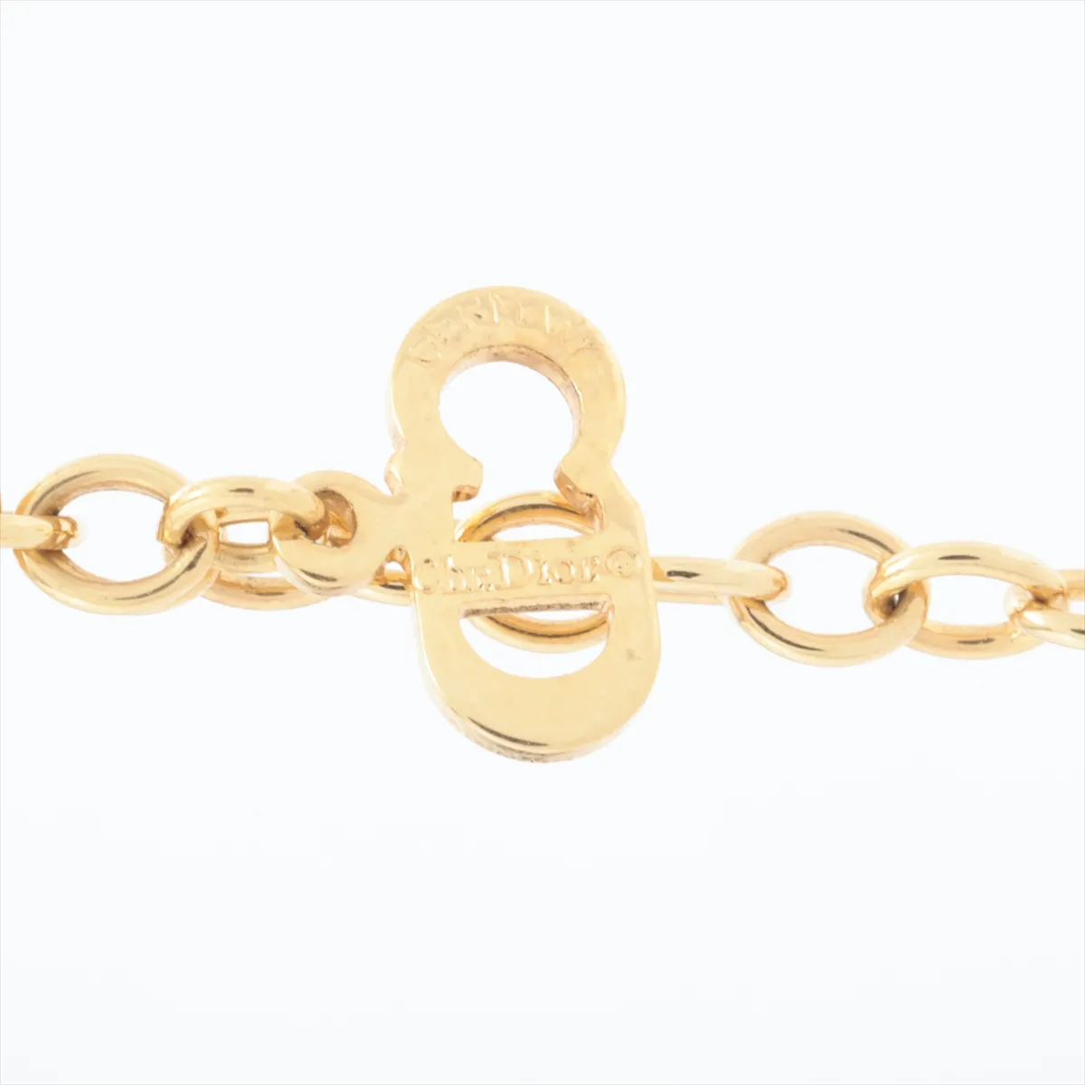 CD logo necklace, gold plated with rhinestones. Shows signs of wear, — view 4