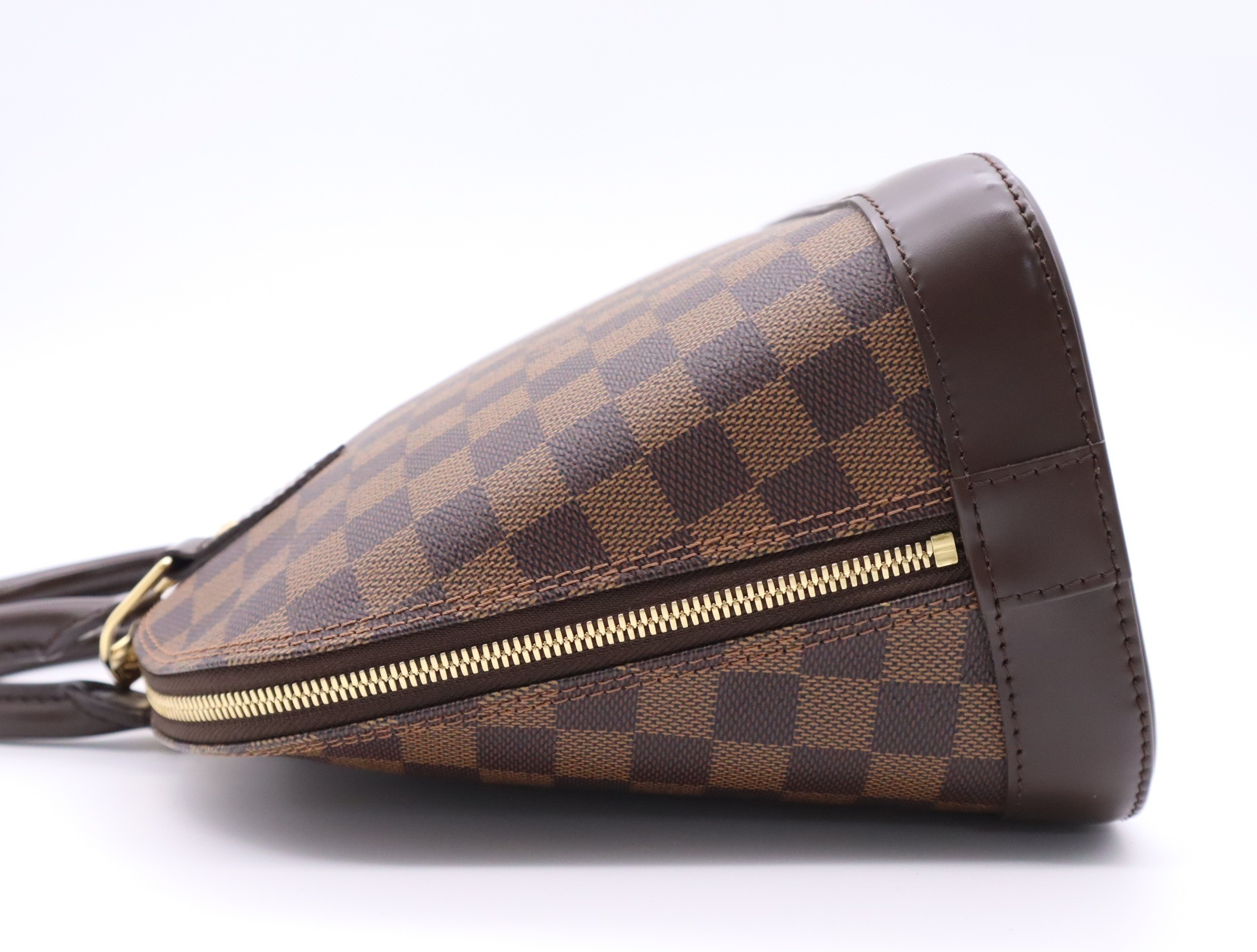Alma PM includes padlock, 2 keys, clochette, and storage bag. — view 3