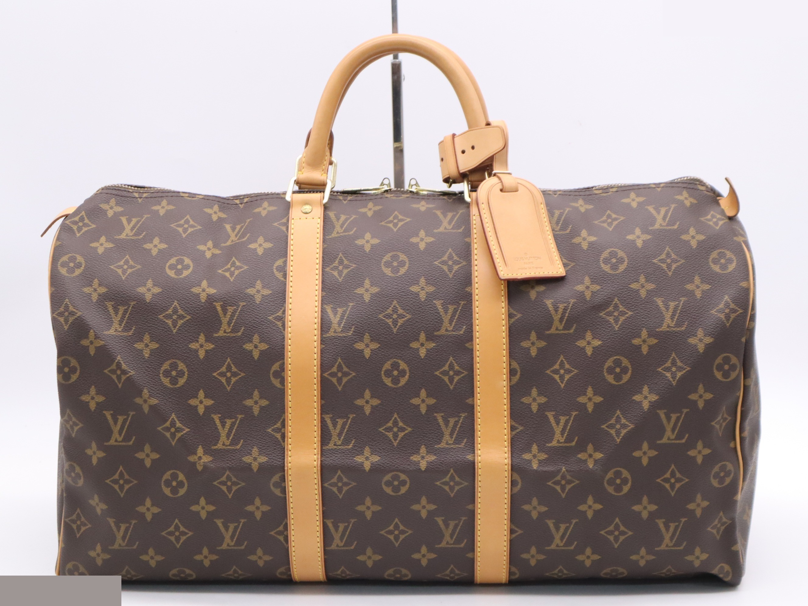 Keepall 50 with name tag and handle strap.