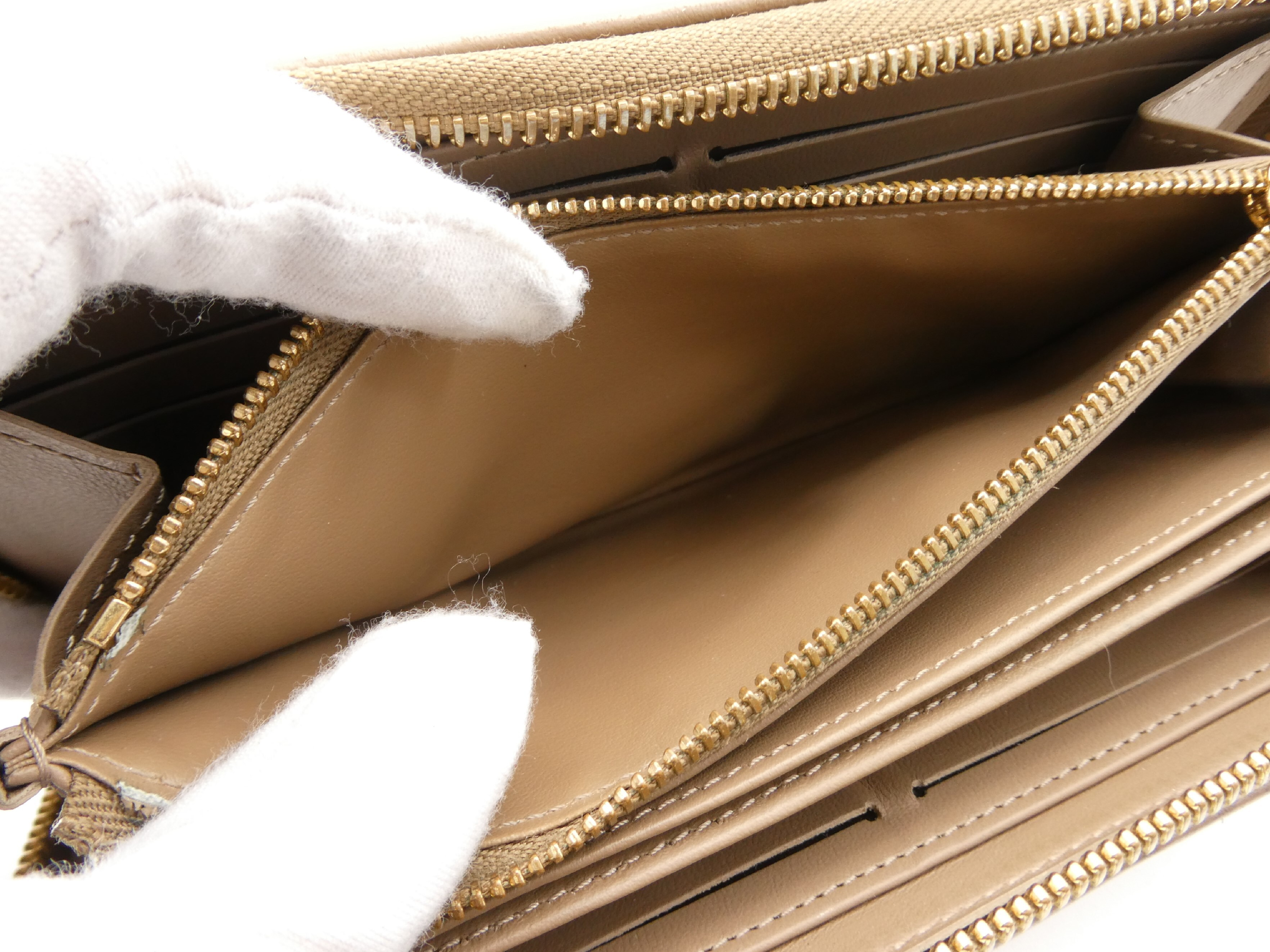 Monogram Embossed Zippy Wallet (with IC chip functionality) — view 8