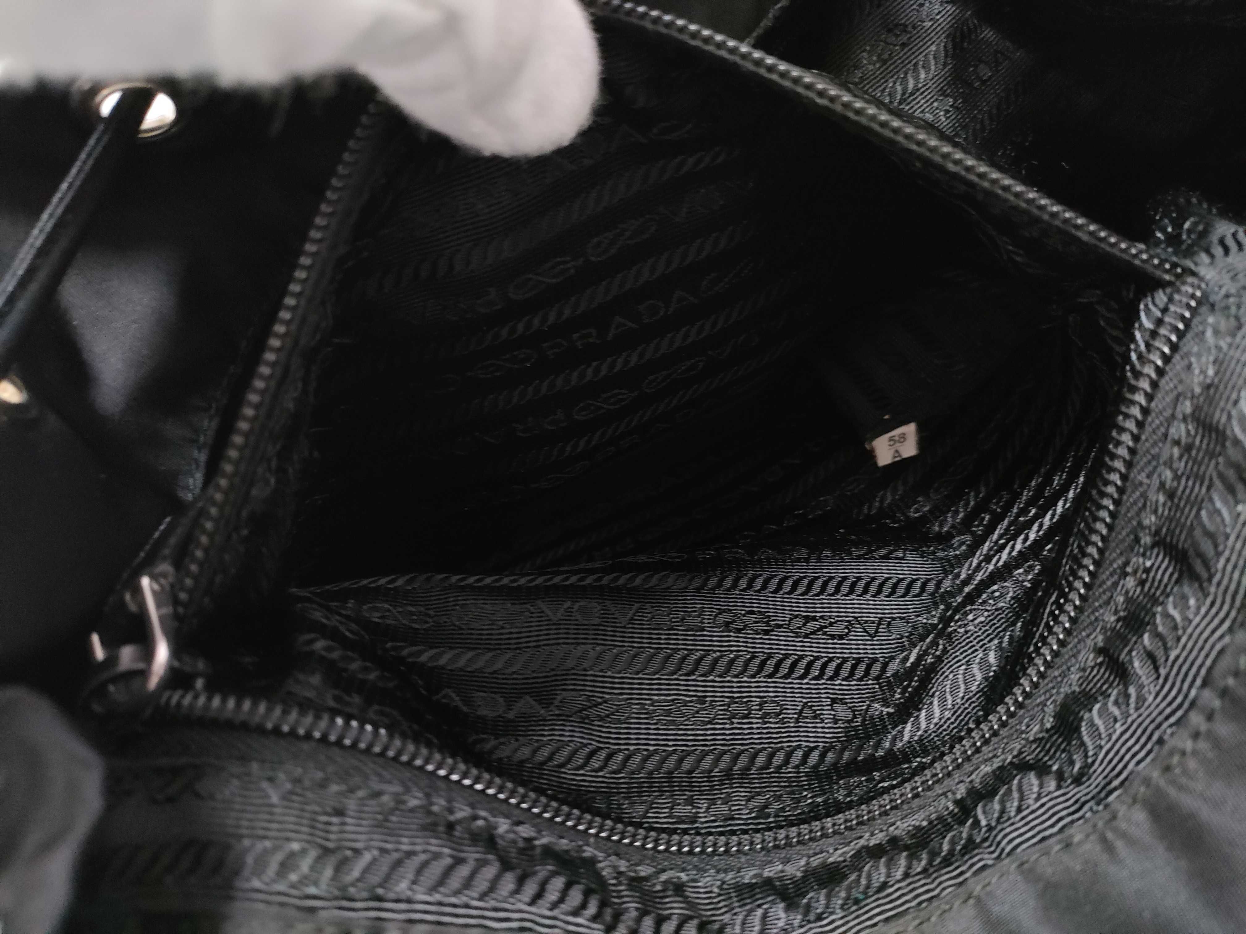 nylon backpack, current model, with triangular logo. — view 13