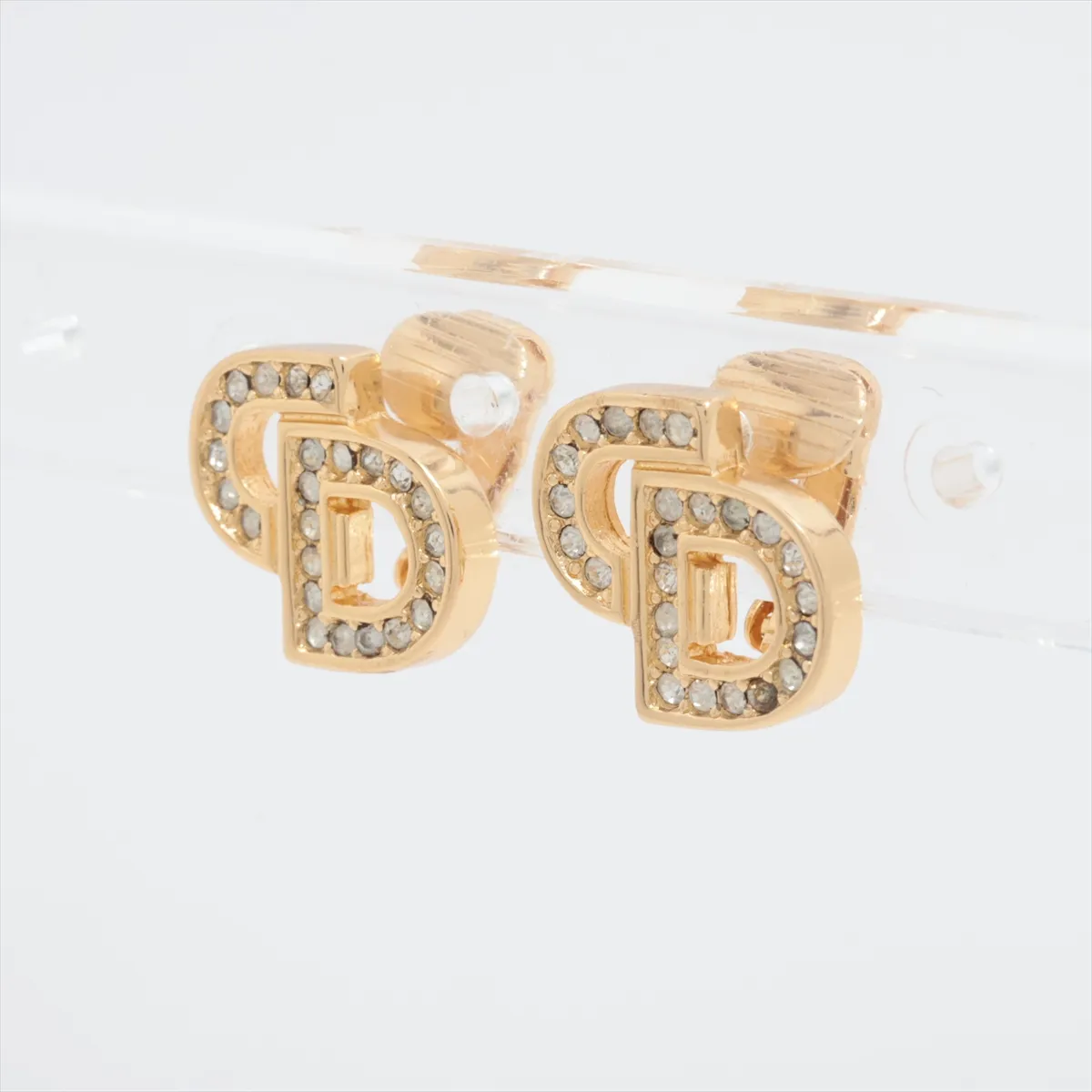 CD logo earrings (for both ears), gold-plated with rhinestones. Shows wear, tarnishing, — view 3