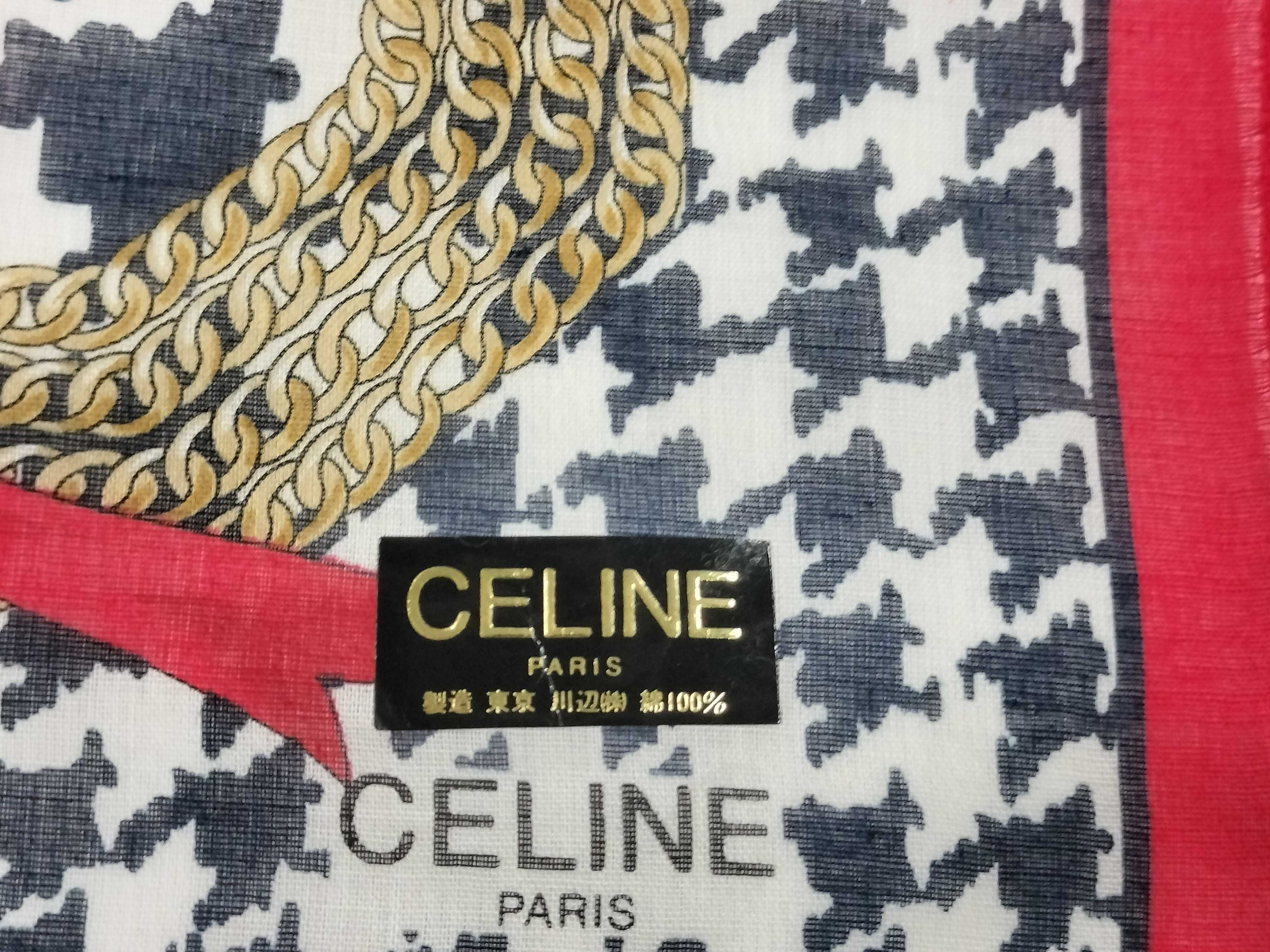 handkerchief scarf with sticker, houndstooth pattern, chain, and other accessories. — view 4