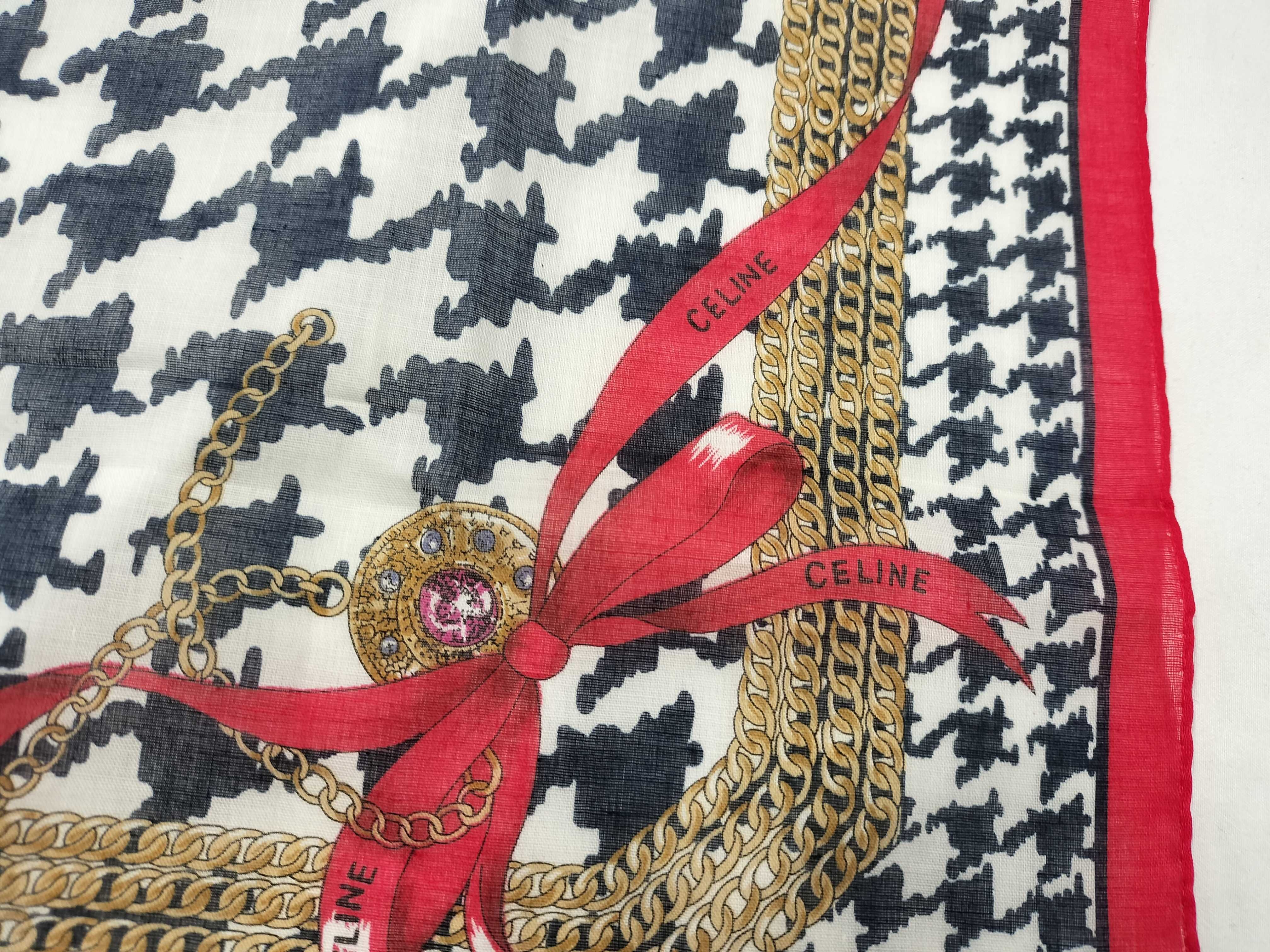 handkerchief scarf with sticker, houndstooth pattern, chain, and other accessories. — view 5