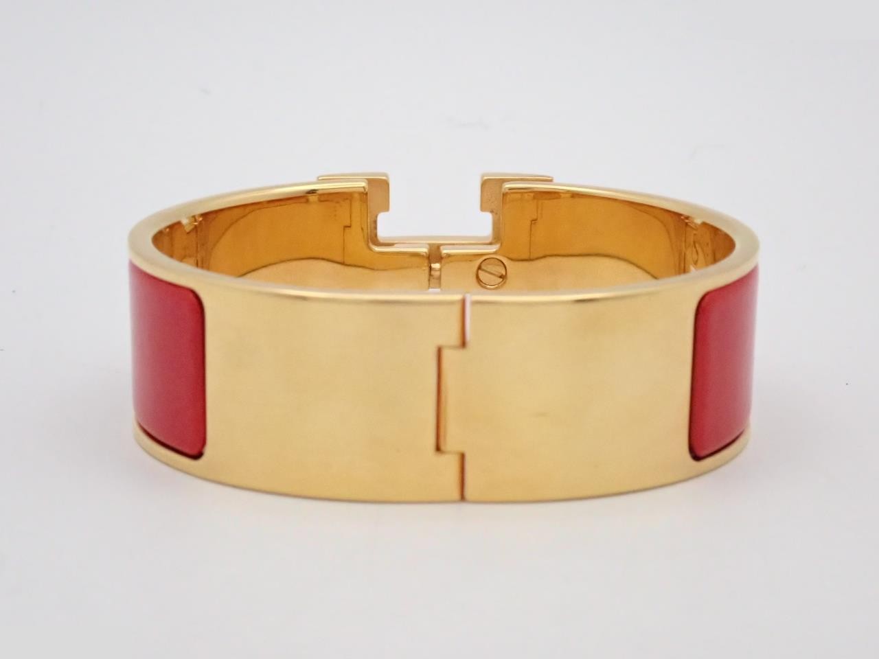 Click Clack bangle, red/gold color, wrist circumference approximately 16cm — view 2