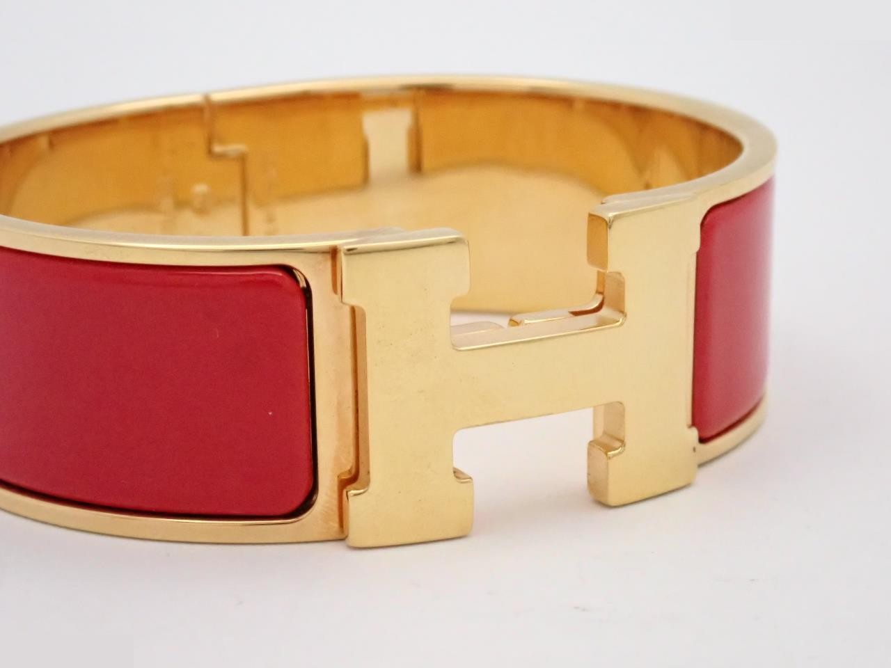 Click Clack bangle, red/gold color, wrist circumference approximately 16cm — view 3