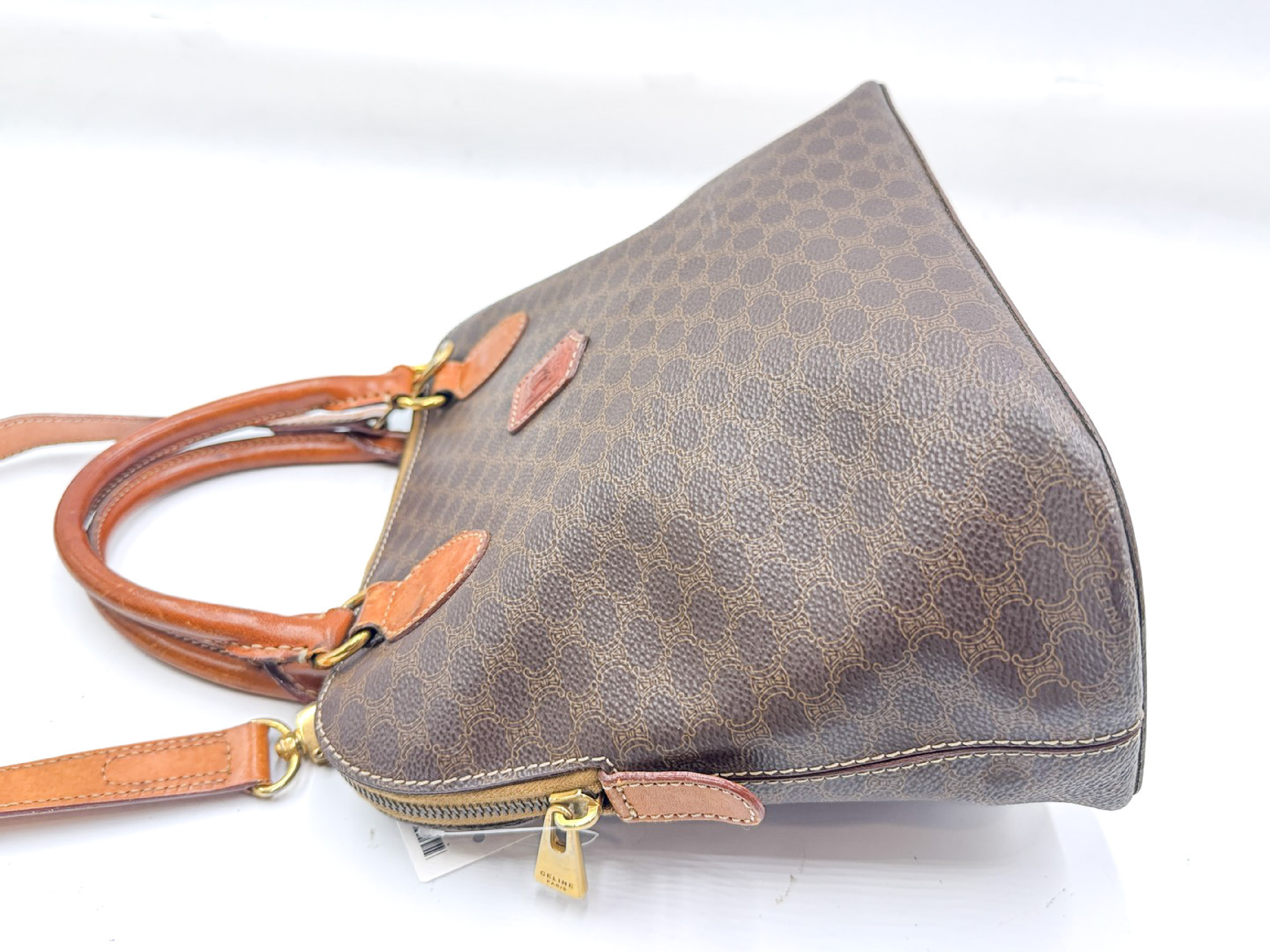 2-way strap-attached leather handbag with Macadam pattern and gold hardware. — view 7