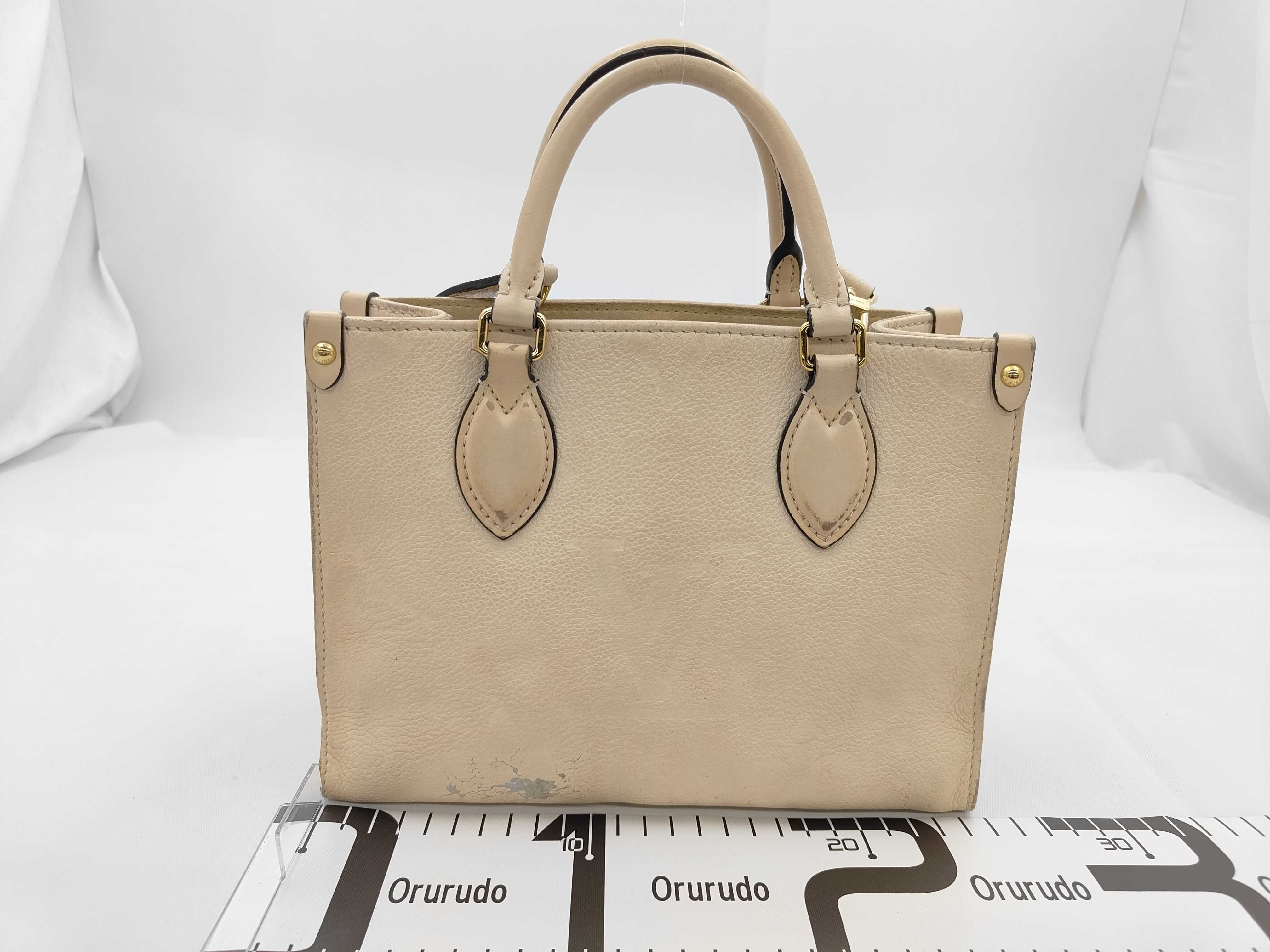 Monogram Empreinte OnTheGo PM M46569 Beige Handbag (RFID detected) — view 2