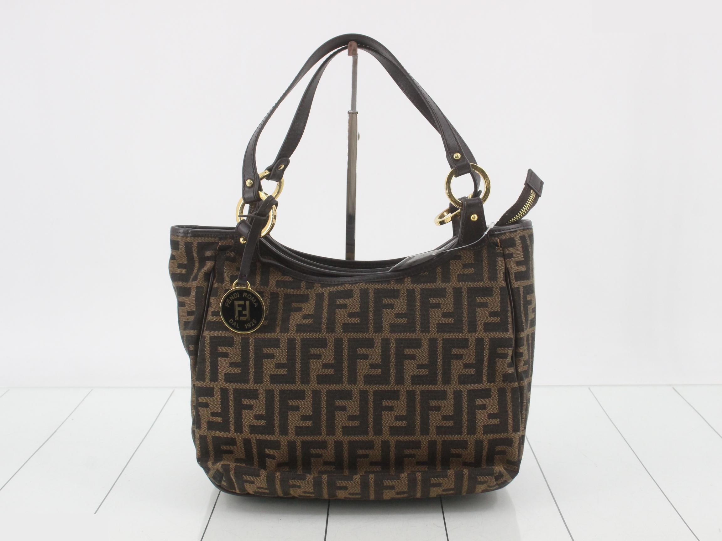 Zucca (bag) tote bag with gold hardware.