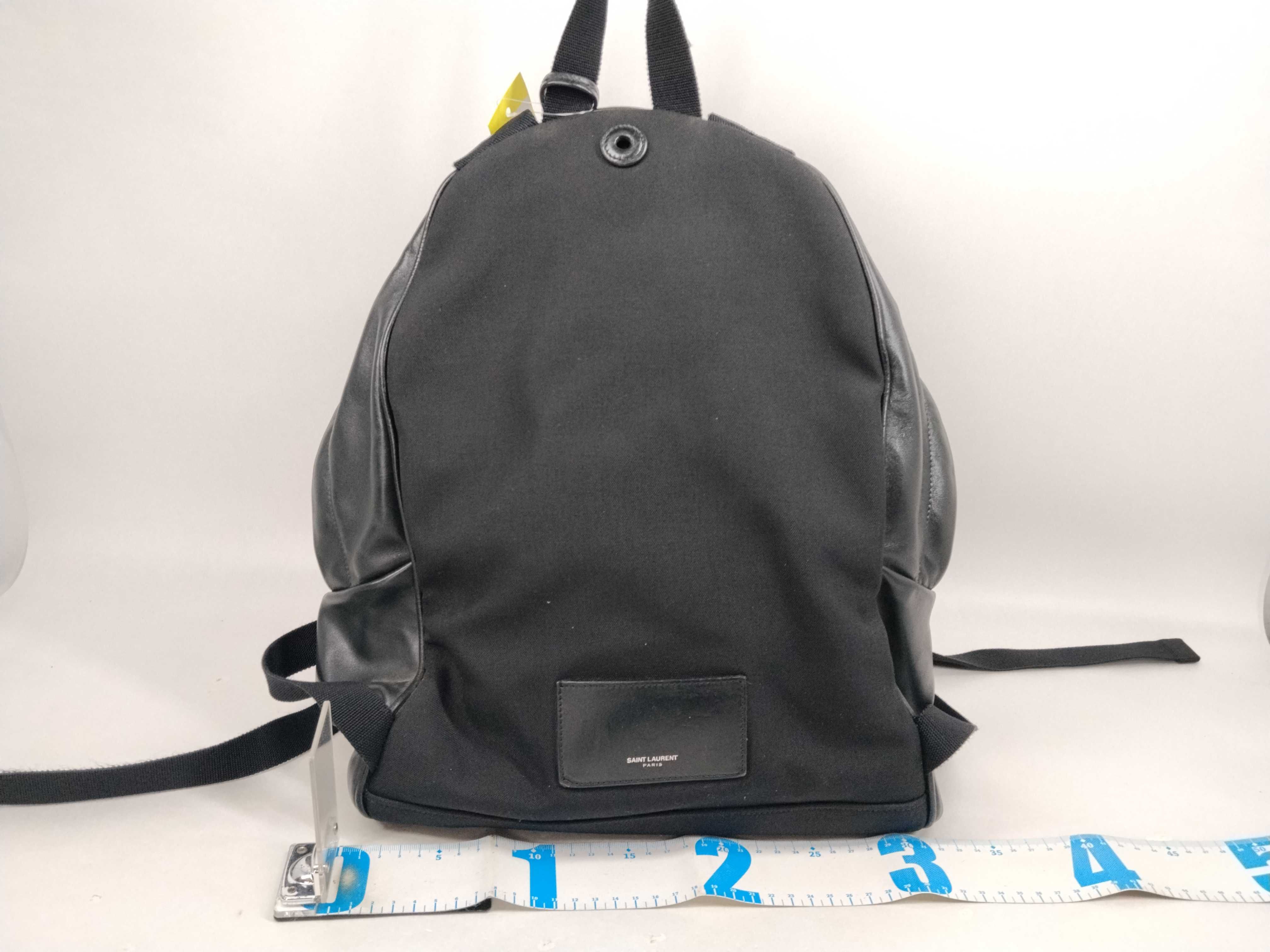 leather backpack, missing zipper hardware. — view 2
