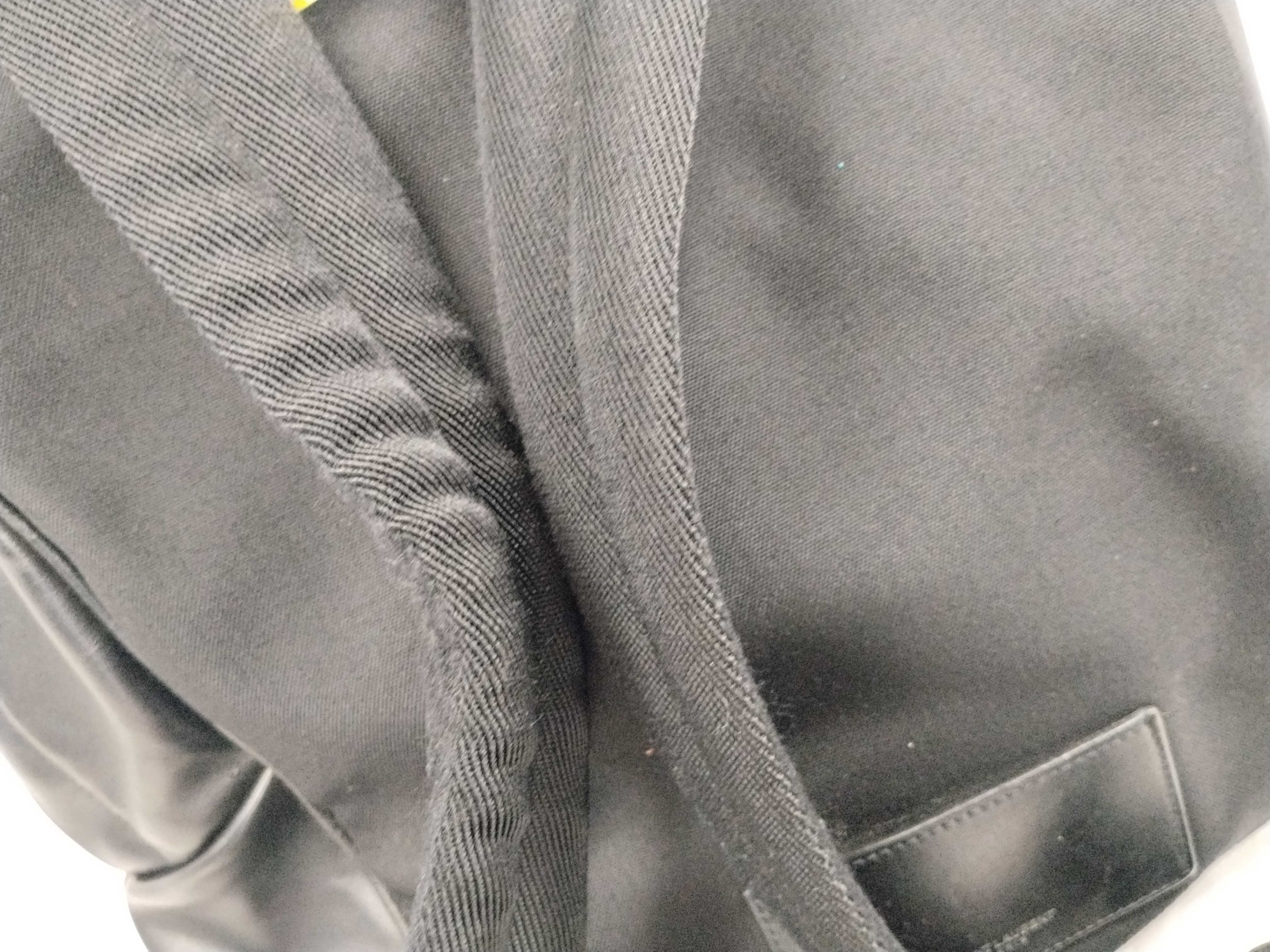 leather backpack, missing zipper hardware. — view 5