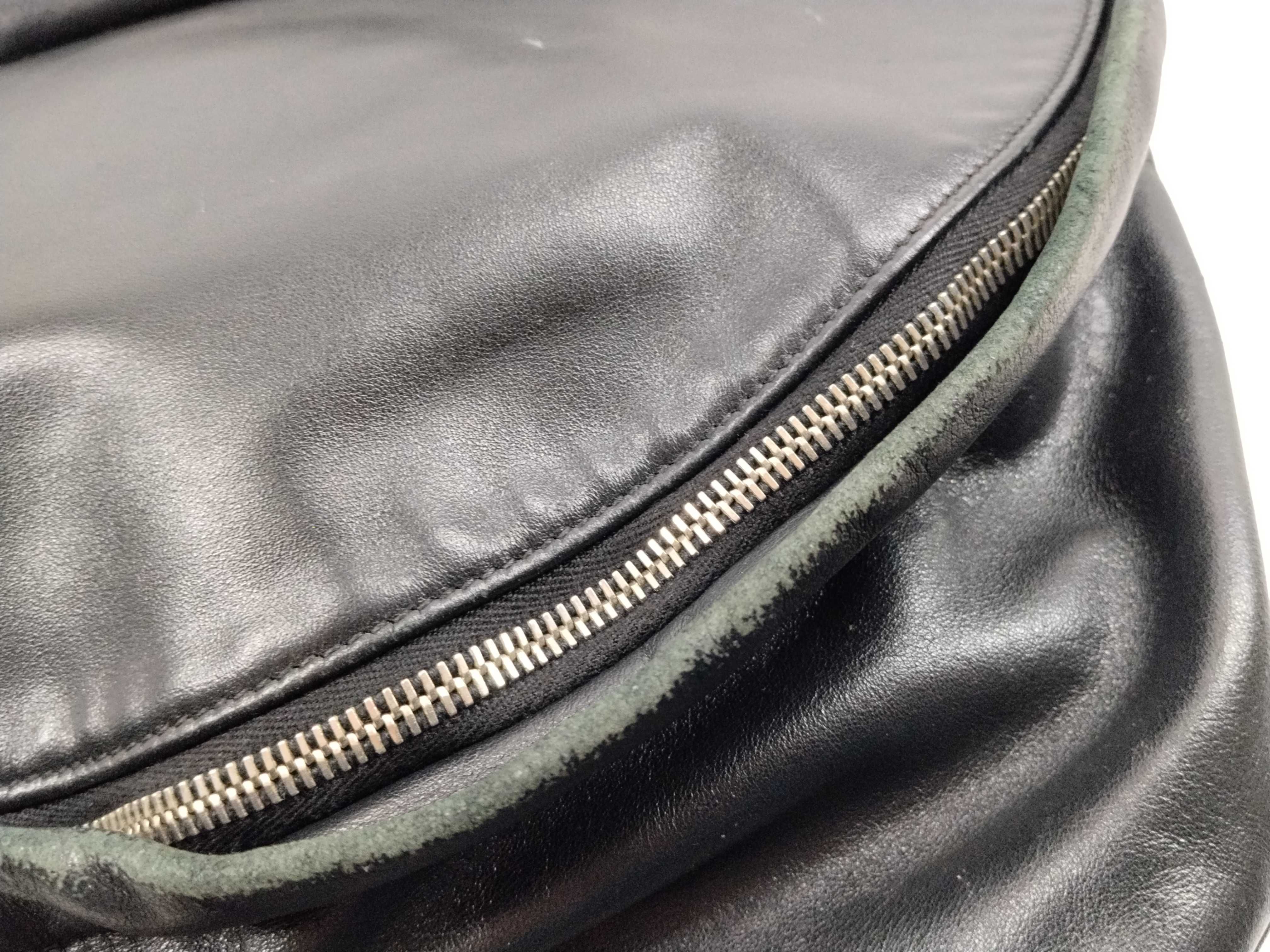leather backpack, missing zipper hardware. — view 6