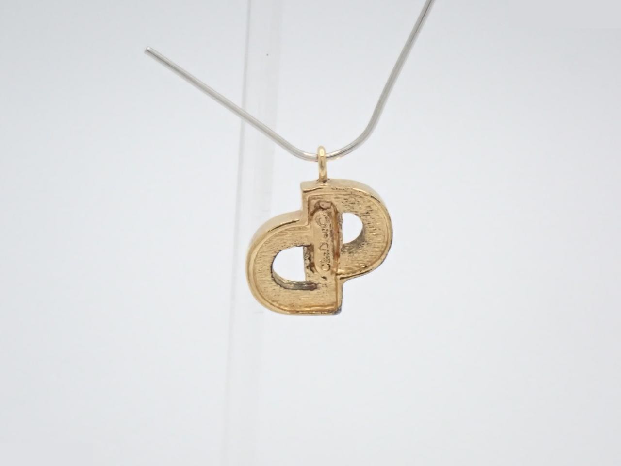 CD logo pendant top — view 2