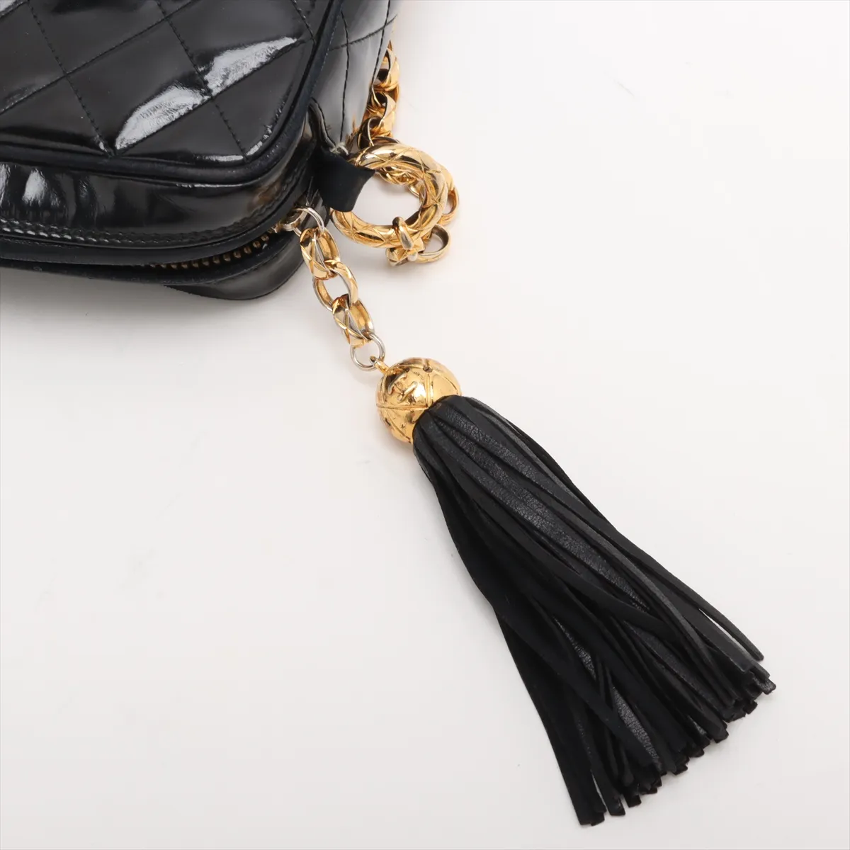 Matelasse patent leather chain shoulder bag with fringe black gold hardware — view 10