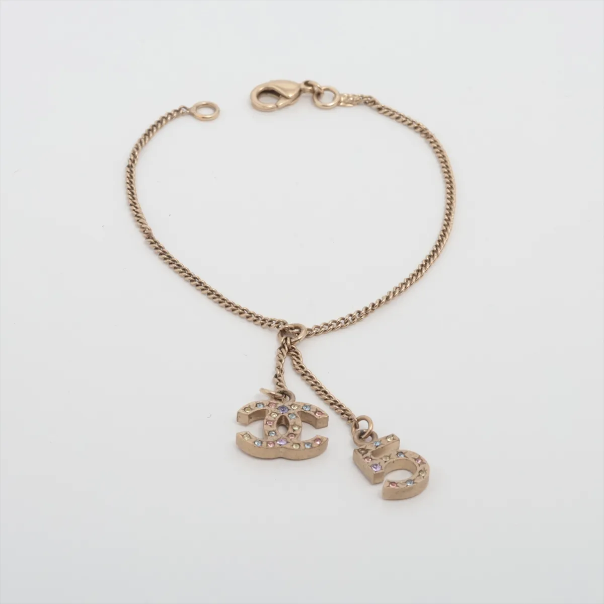 Coco Mark No. 5 06A Bracelet, GP x Rhinestone, Gold. Shows