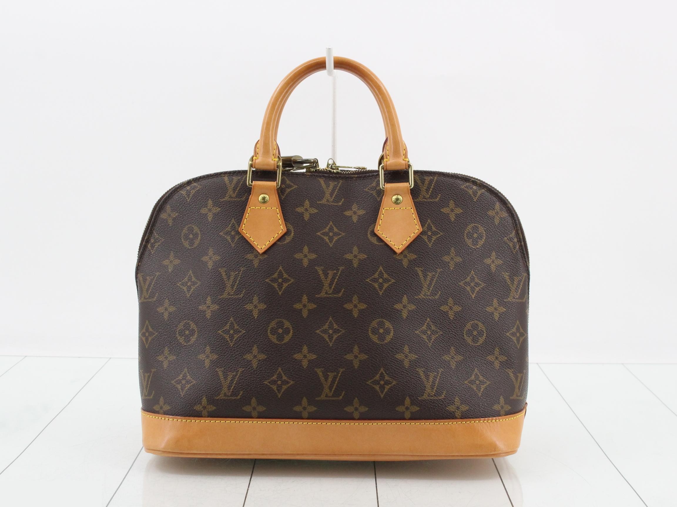 Alma Monogram Handbag
