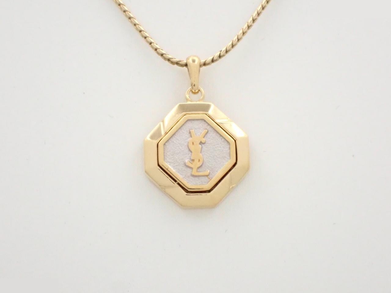 Other lines: Precious metals, necklaces, pendants, logo, octagon, gold.