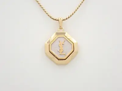 Other lines: Precious metals, necklaces, pendants, logo, octagon, gold.